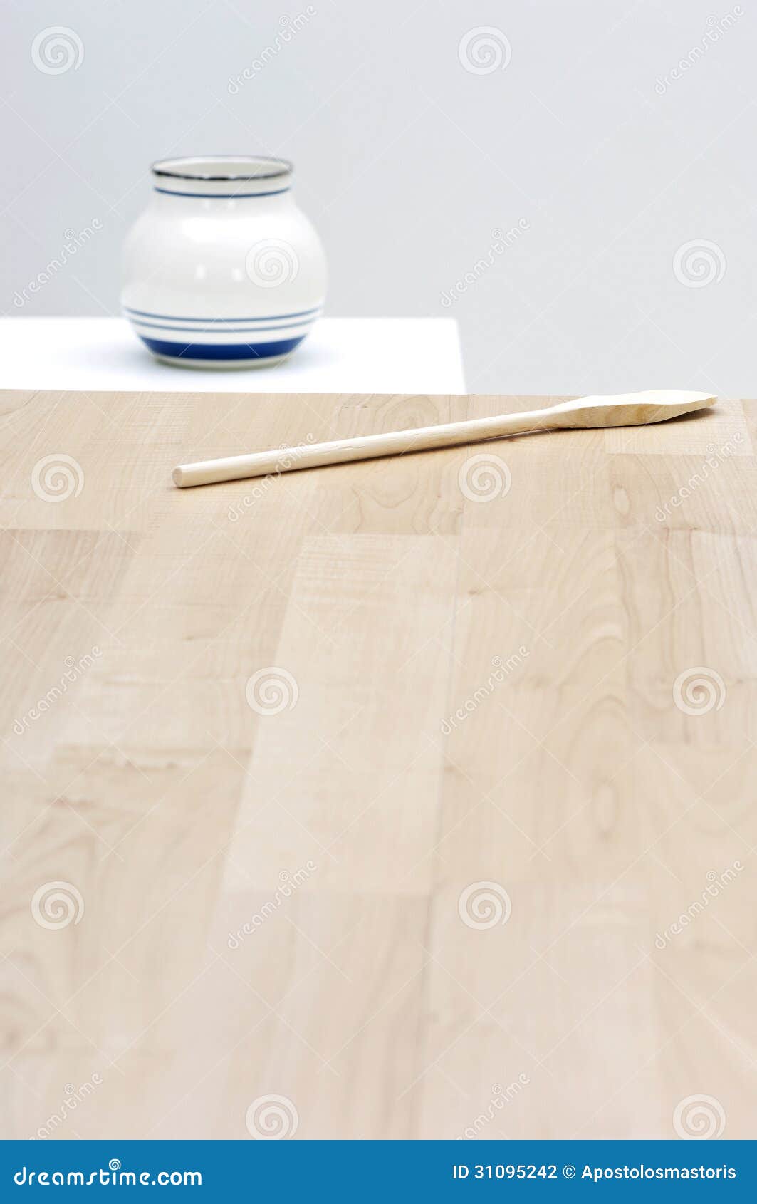 Wooden table in a kitchen. Empty space on a wooden table with kitchen utensil (for message or product)