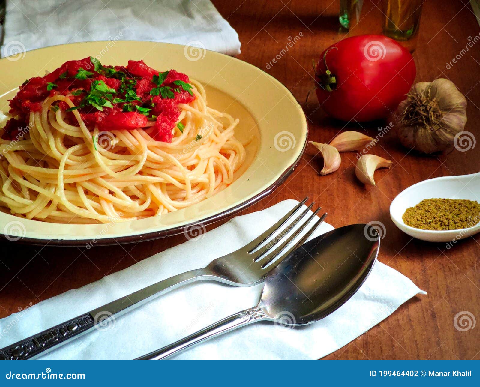 Wooden Table With Spoon Fork Plate Of Hot Spaghetti Pasta With Tomato Sauce Garlic Tomato Oil Bottle Cumin And Napkin Stock Photo Image Of Meal Plate Wooden Table With Spoon Fork Plate Of Hot Spaghetti Pasta With Tomato Sauce Garlic Tomato Oil Bottle Cumin And Napkin Stock Photo Image Of Meal Plate