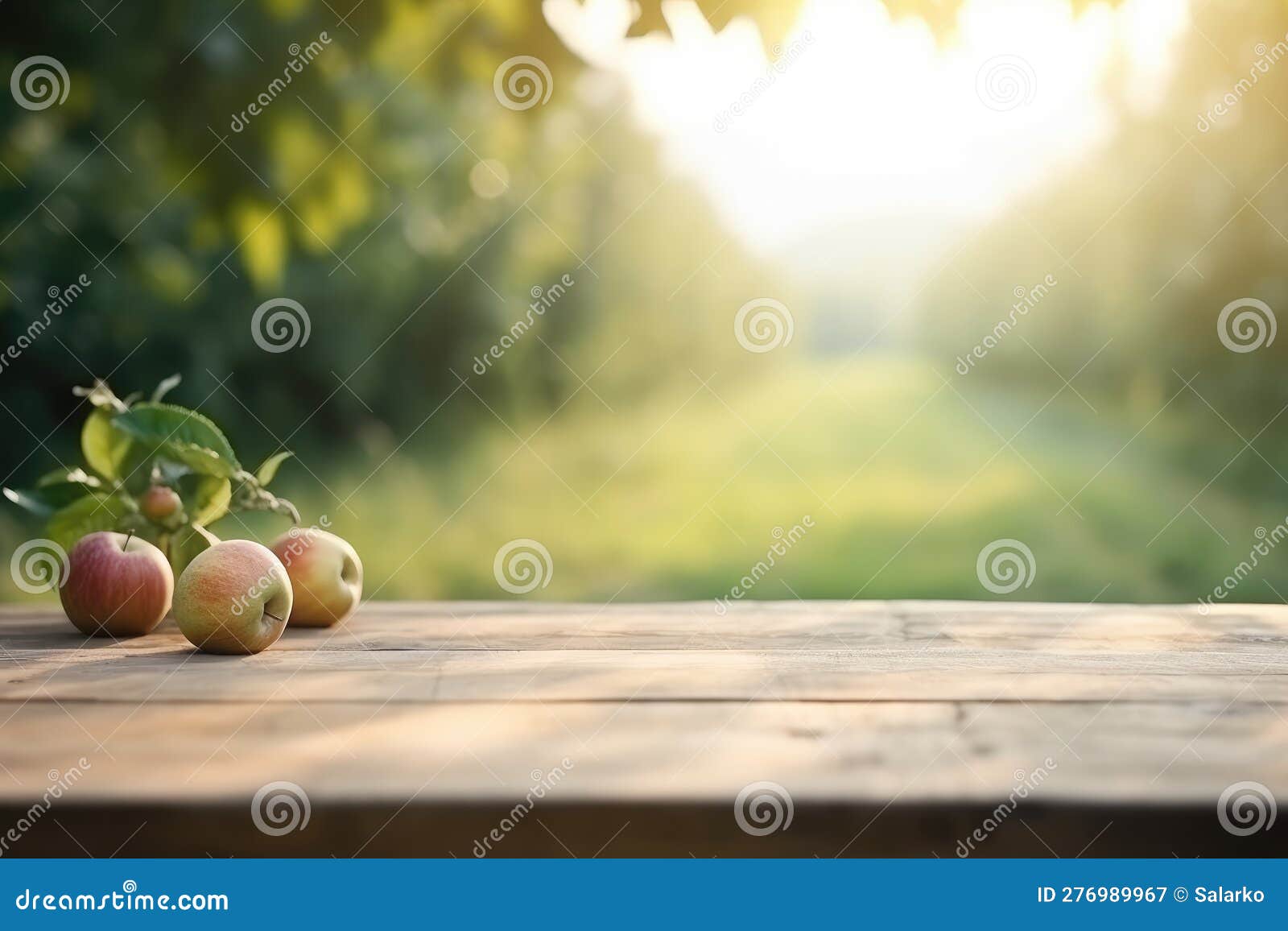 wooden table top with apple garden background