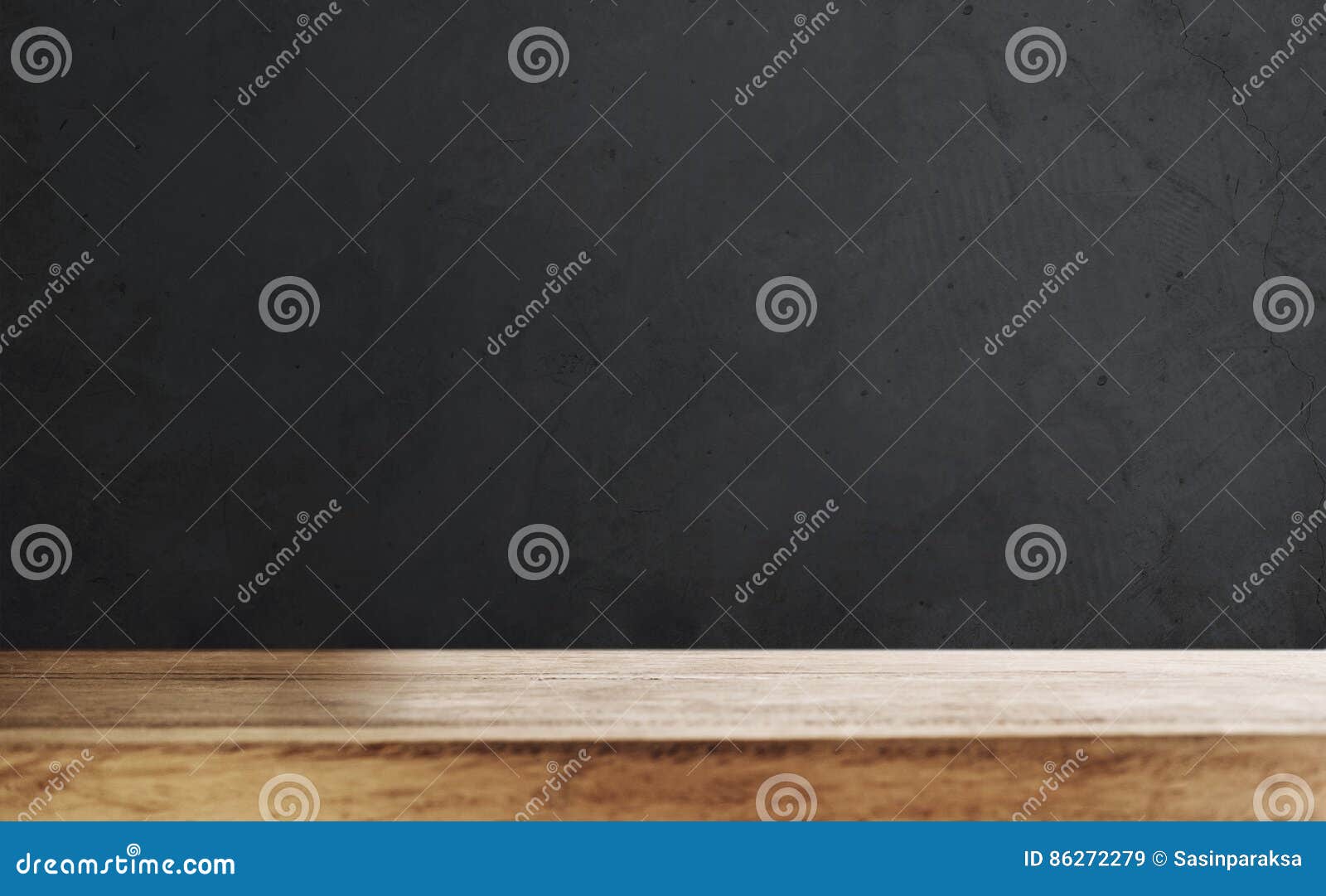 wooden table top with defocus black wall background