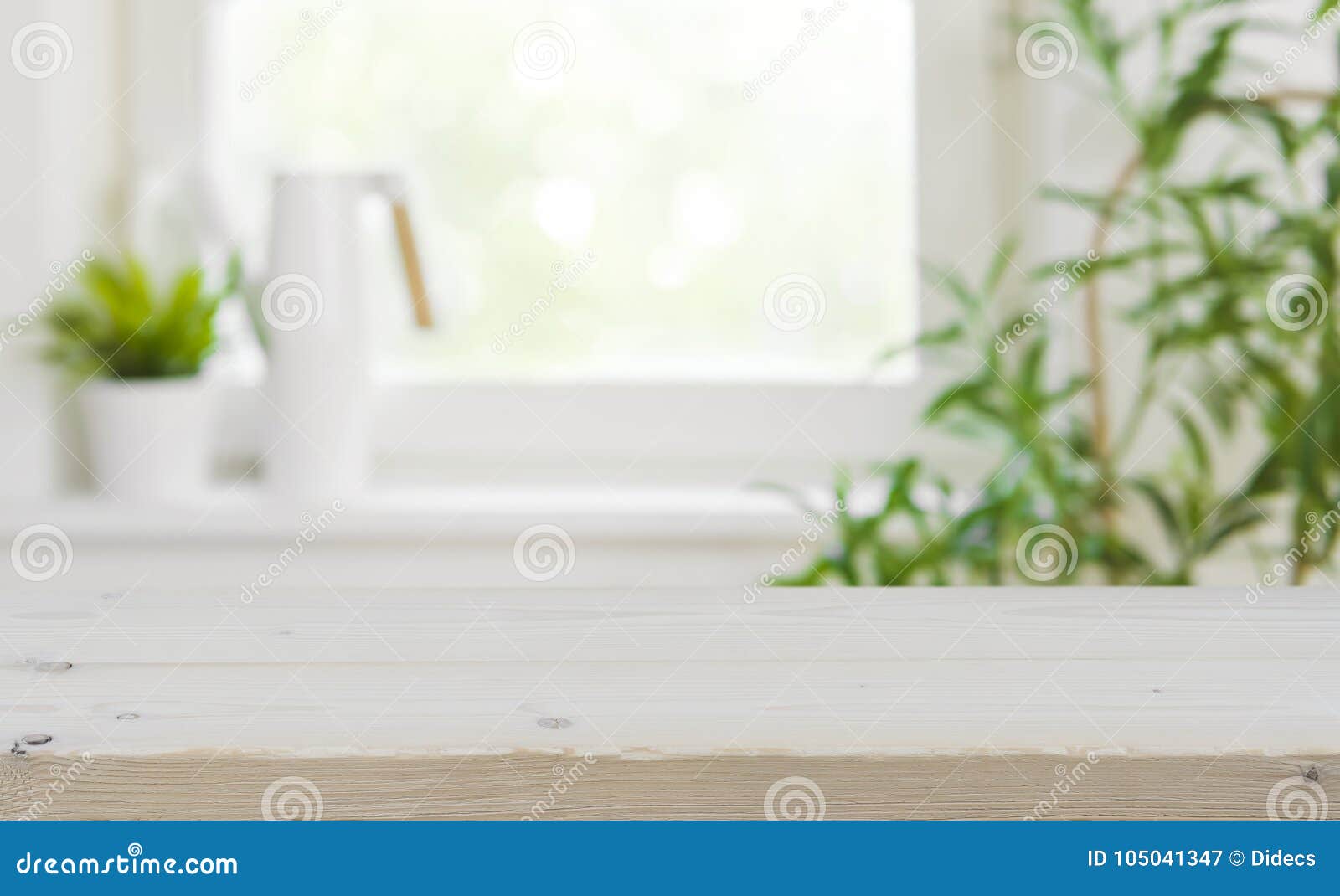 wooden tabletop with copy space over blurred kitchen window background