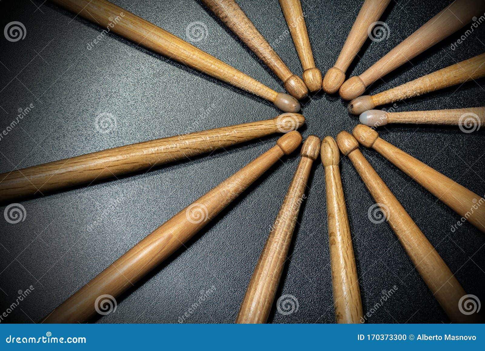 wooden used drumsticks on a dark background - percussion instrument 1