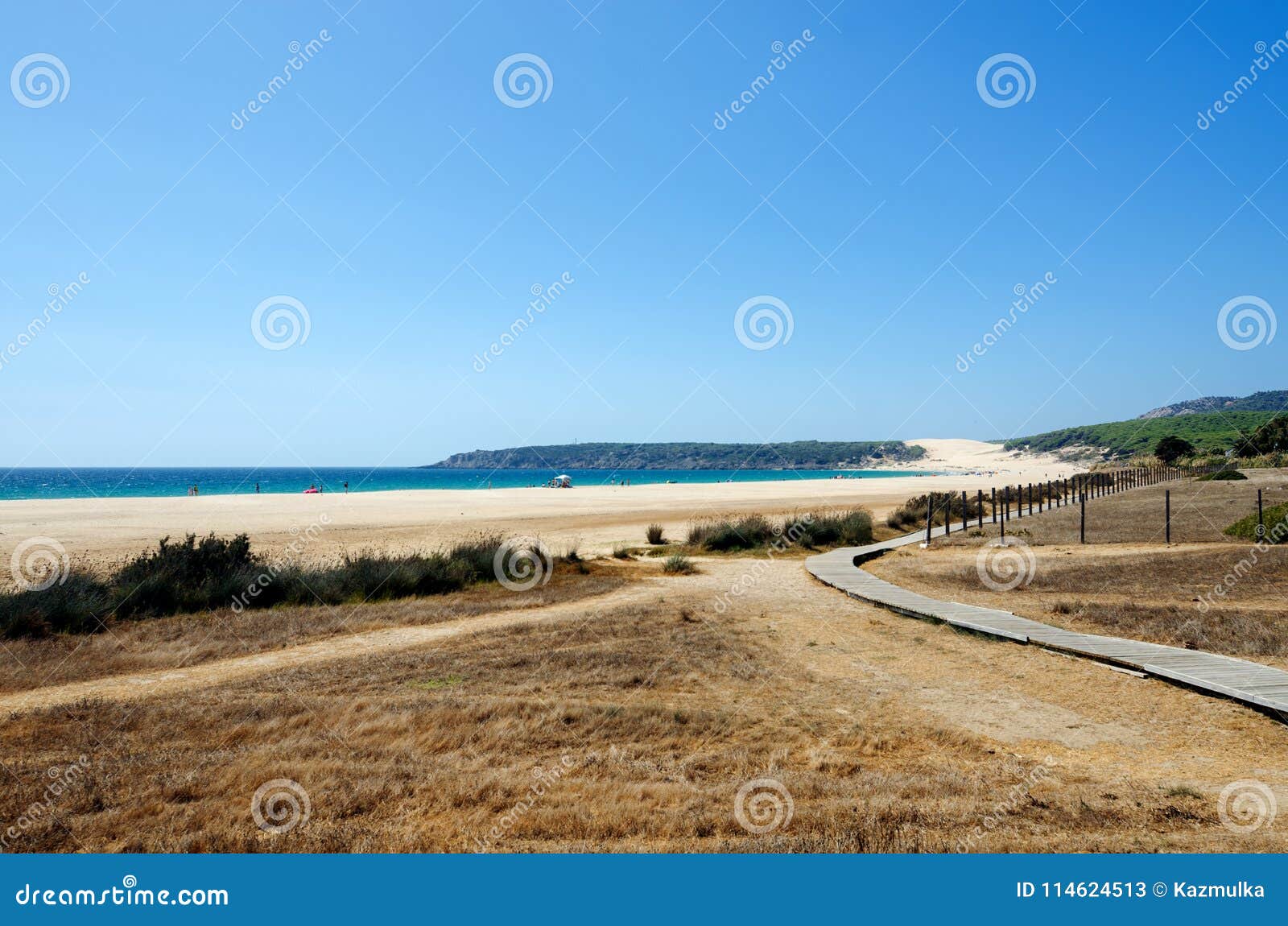 wooden walkway to the beautiful wild beach playa de bolonia on the atlantic coast of tarifa.