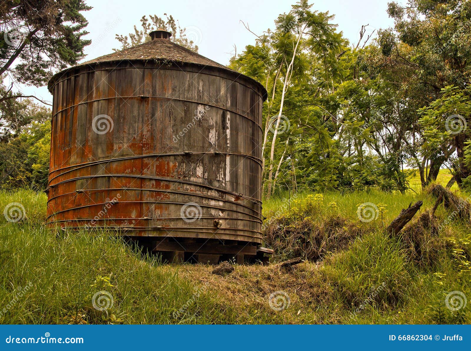 wooden water tank in rural hawaiian backcountry