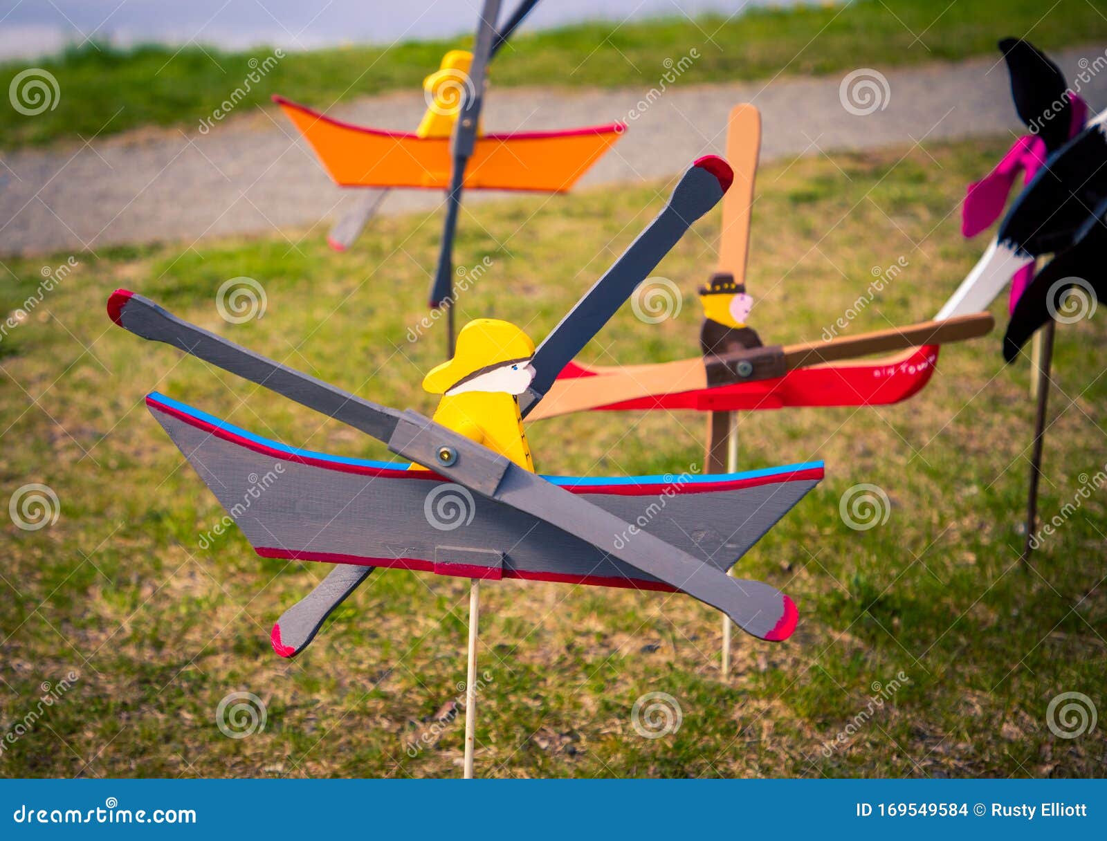 wooden whirligig fisherman and boat stock photo - image of