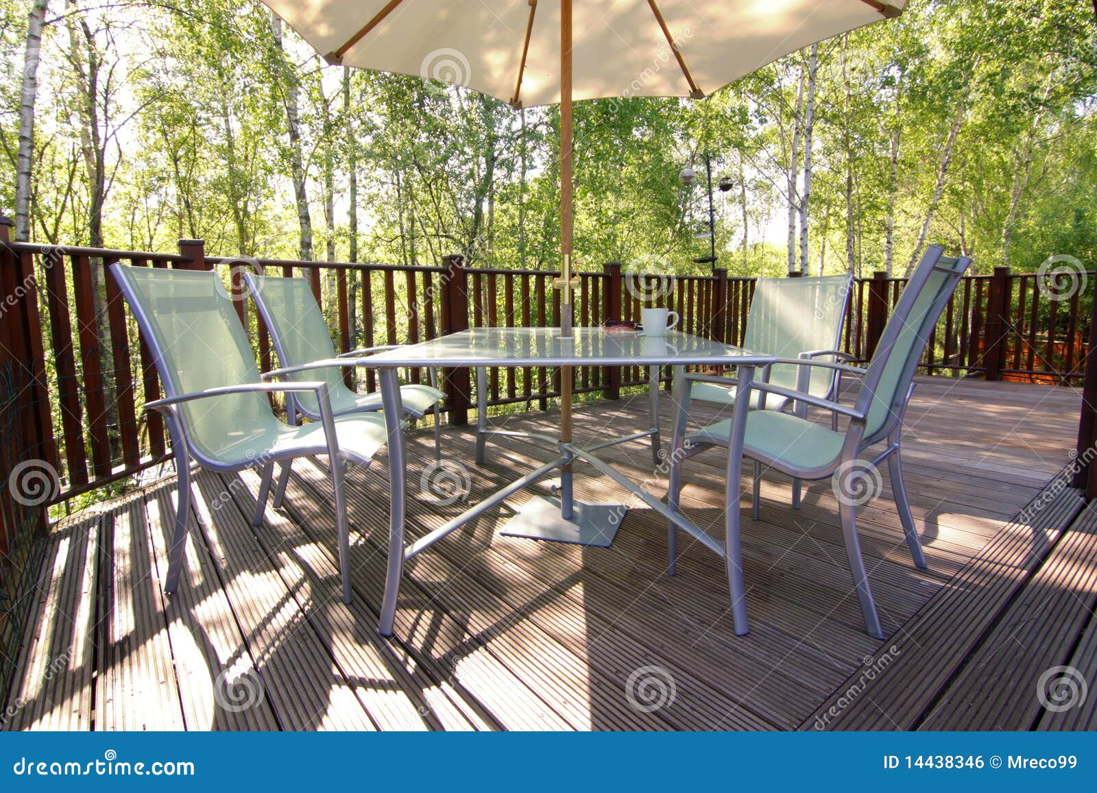 Woodland Deck and Patio Set Stock Photo Image of parasol, chairs