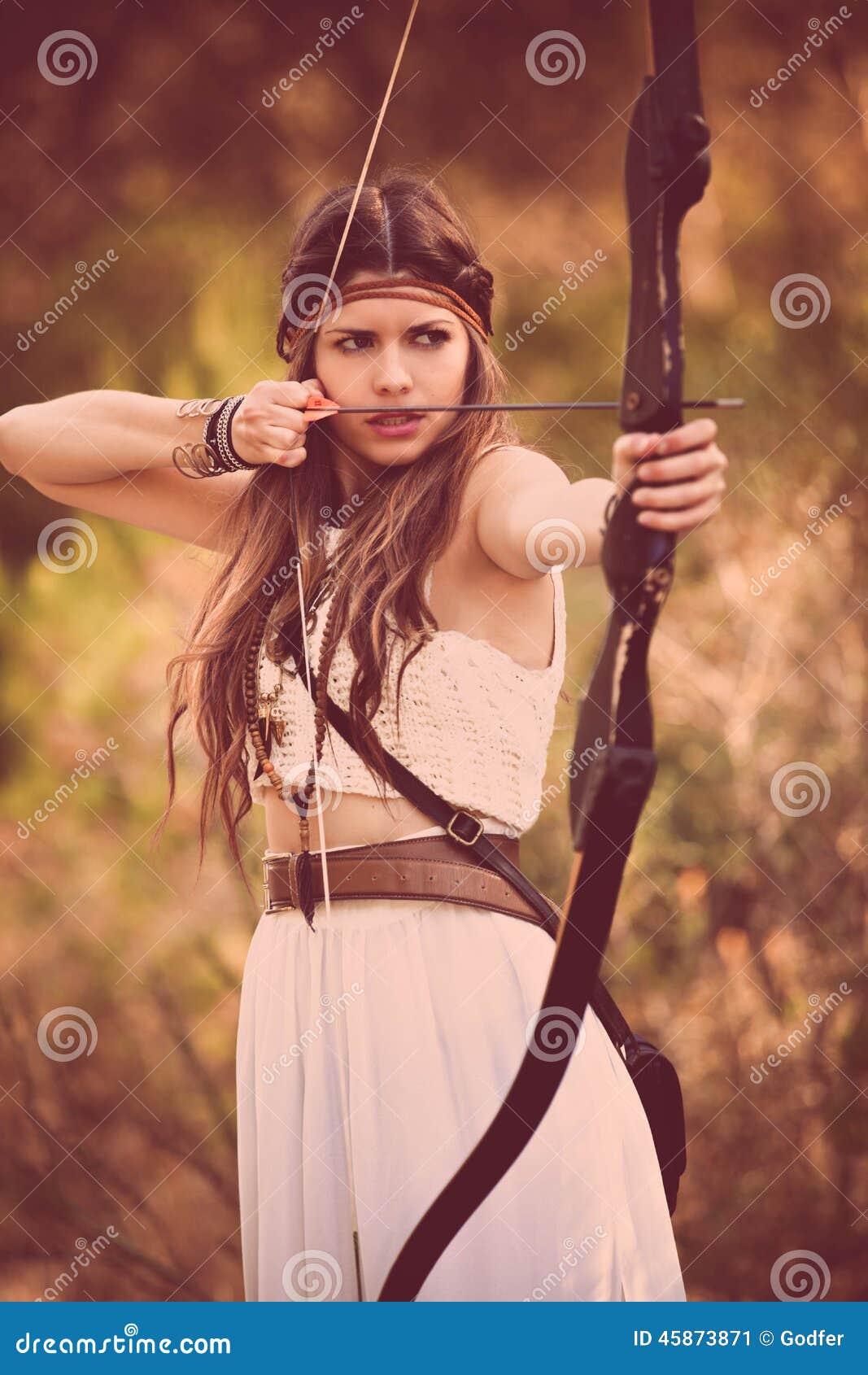 woodland hunter woman with bow and arrow