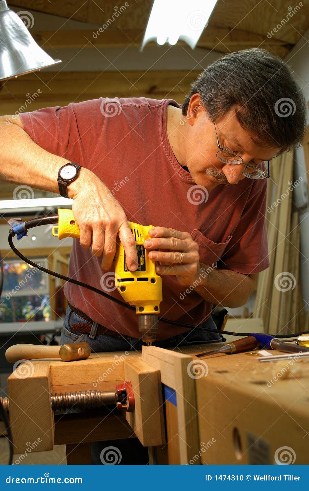 woodworker with drill