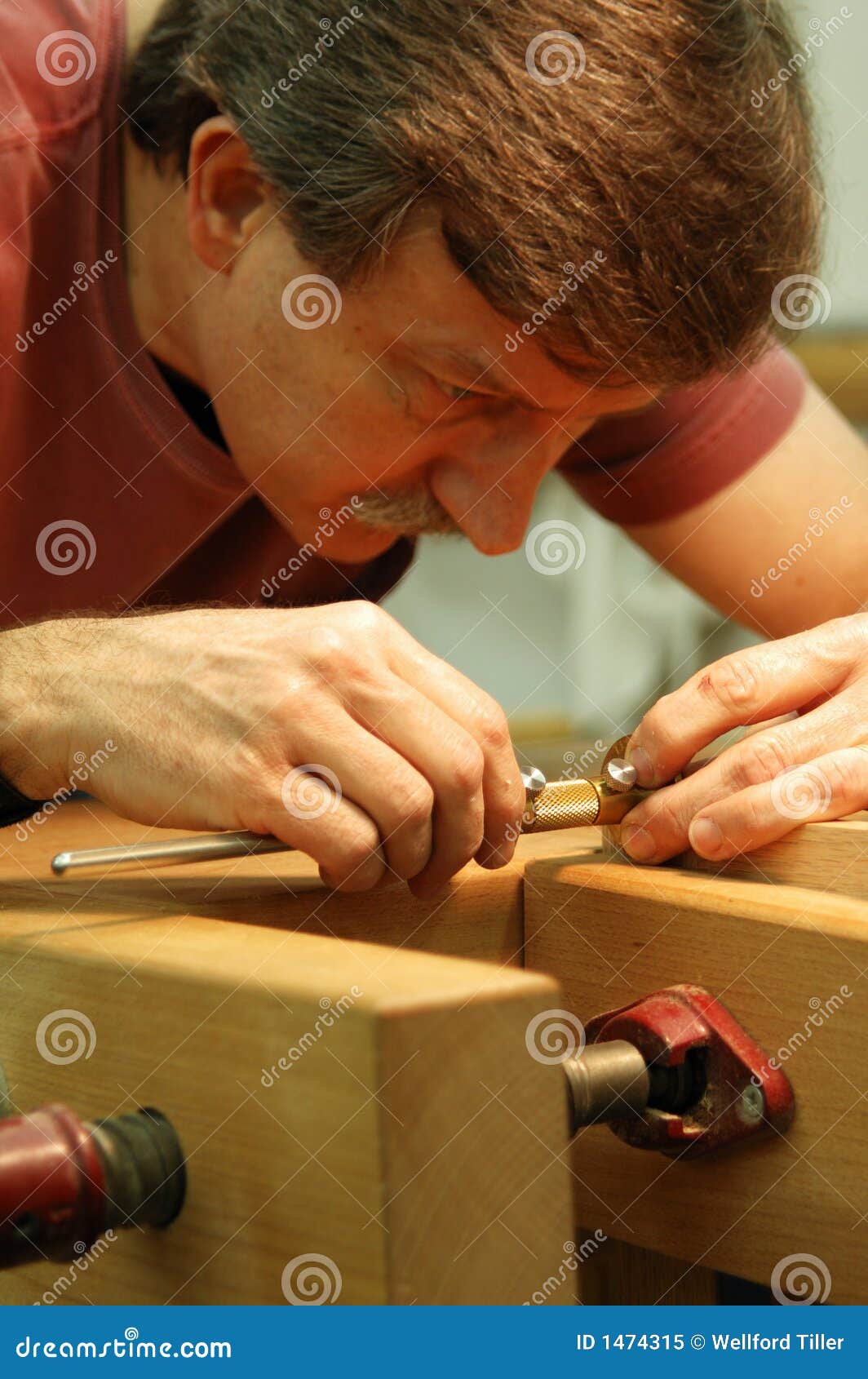 woodworker making close measurement