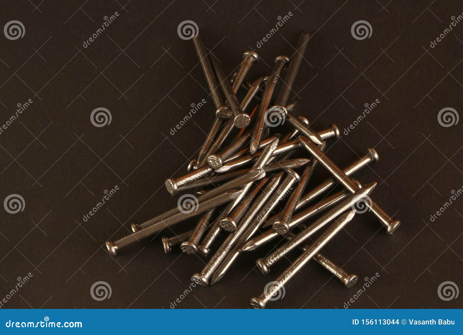 Metallic Iron Nails in Black Background Stock Photo - Image of ...