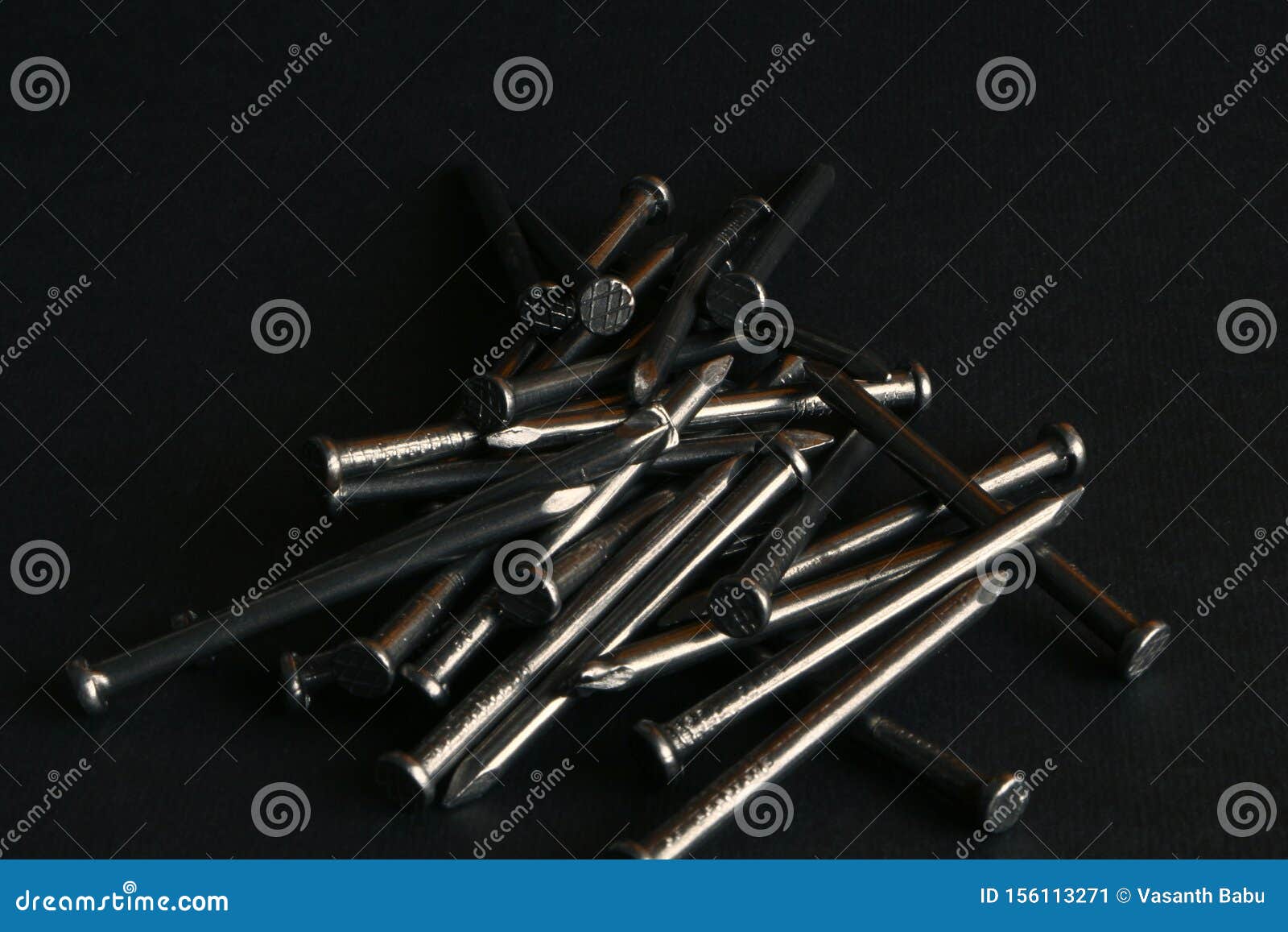 Metallic Iron Nails in Black Background Stock Image - Image of ...