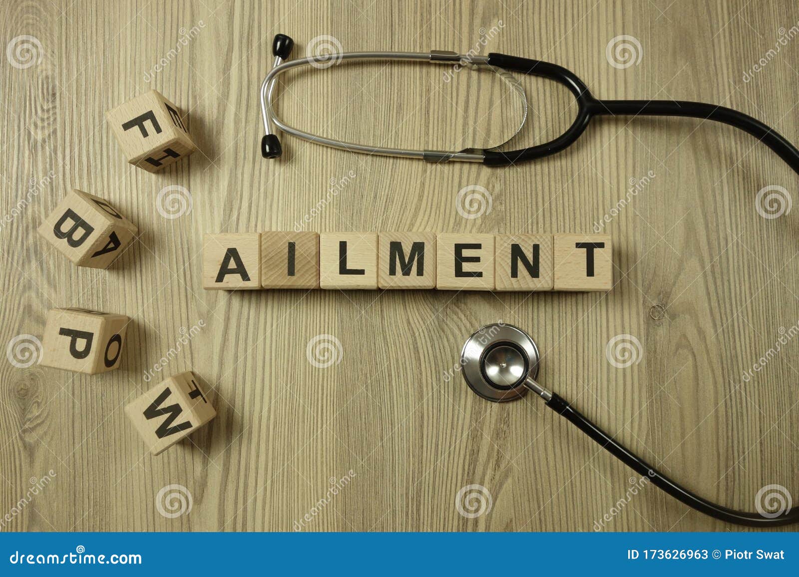 word ailment from wooden blocks with stethoscope
