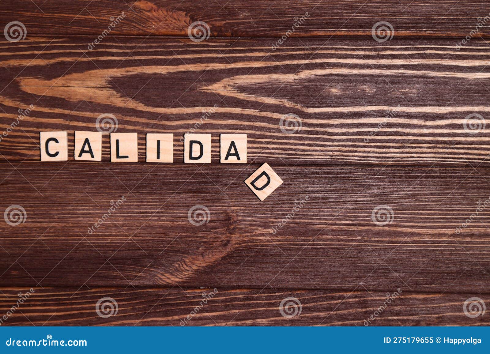 calidad, quality spanish word, lettering on wooden background