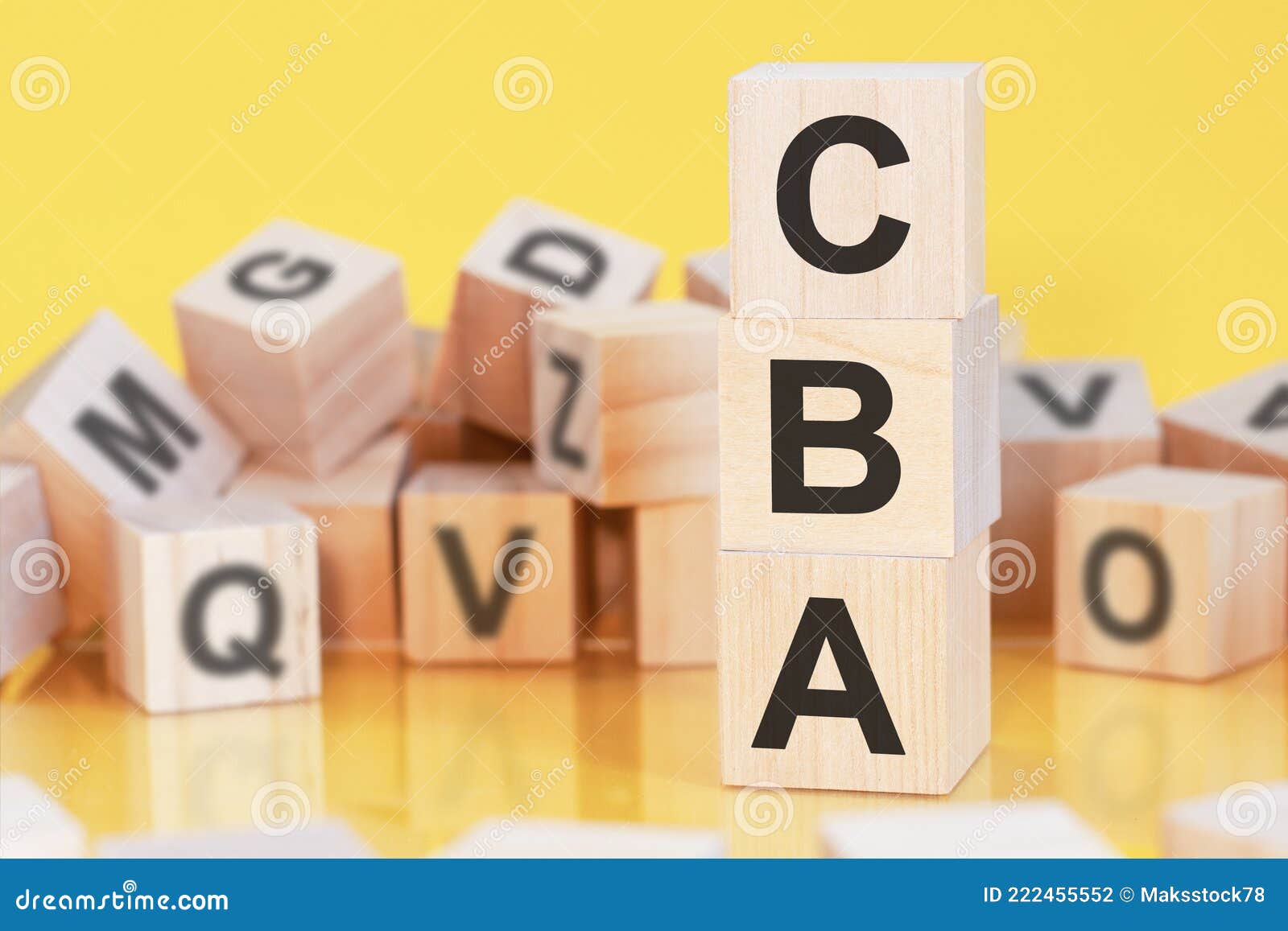 word cba from wooden blocks with letters, concept