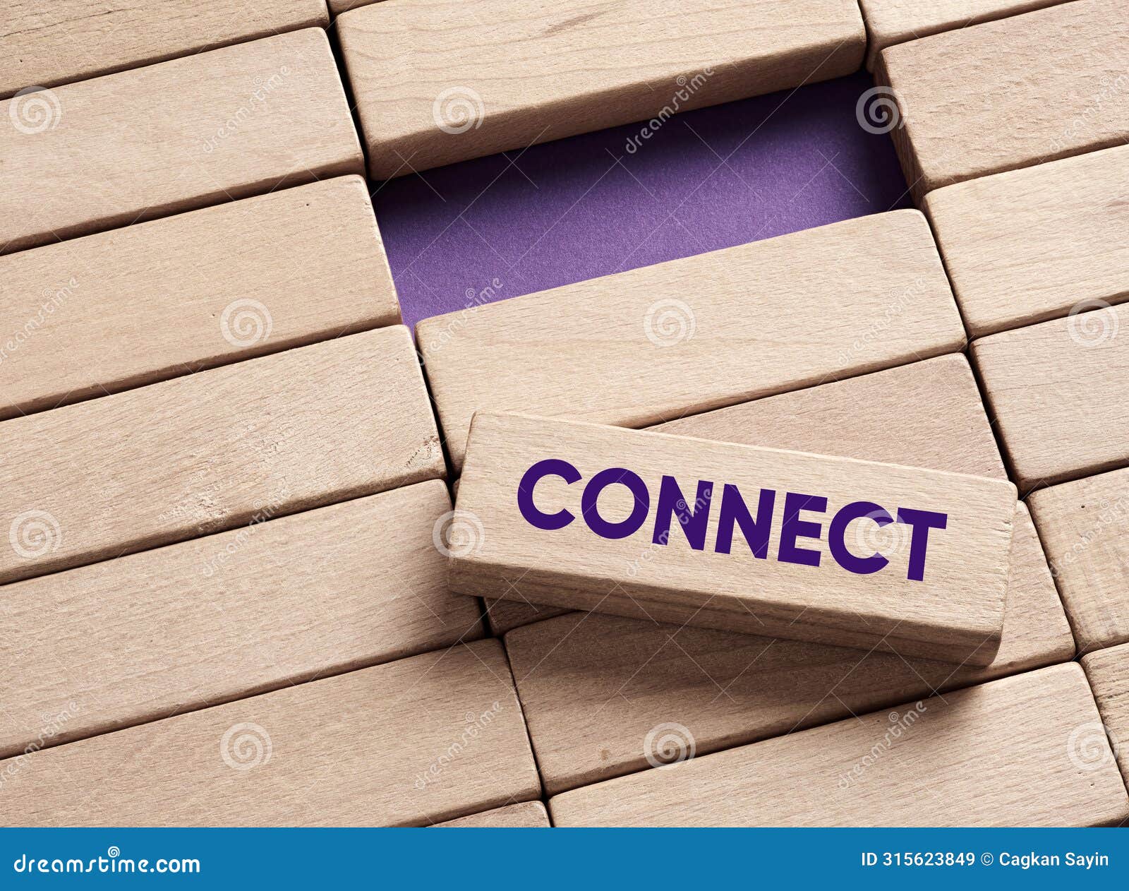 the word connect on wooden blocks. making a connection and bridging the gap