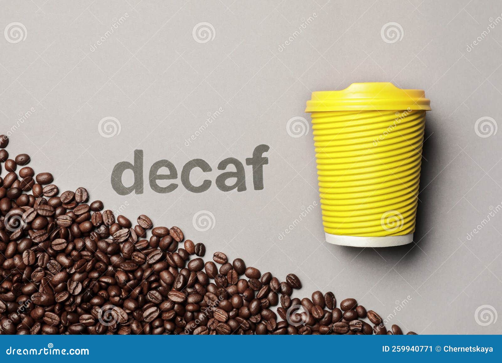 Word Decaf, Coffee Beans and Takeaway Paper Cup on Light Grey