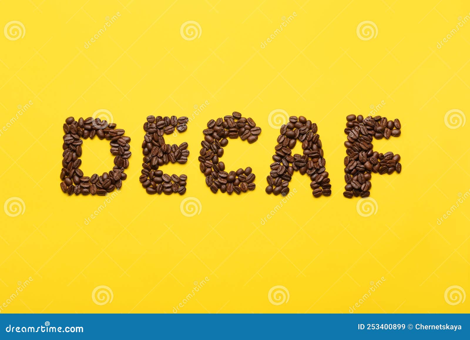 Word Decaf Made of Coffee Beans on Yellow Background, Flat Lay Stock