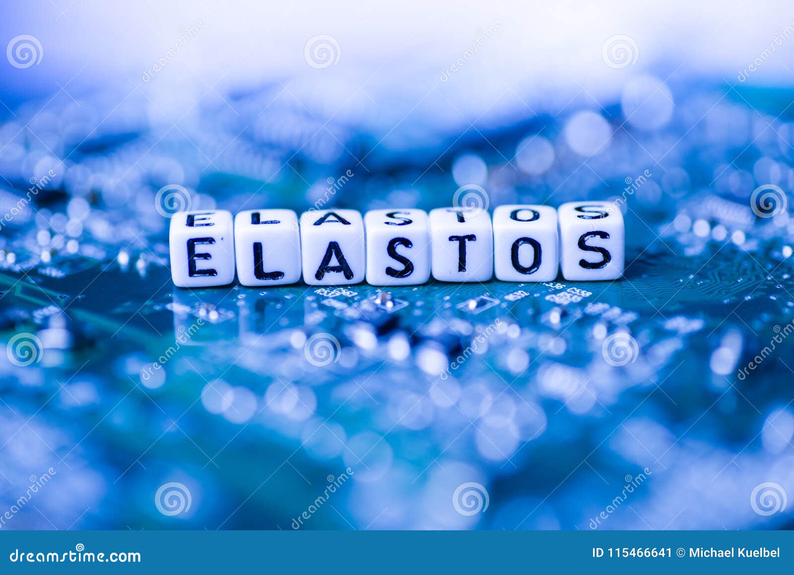 Word ELASTOS Formed By Alphabet Blocks On Mother ...