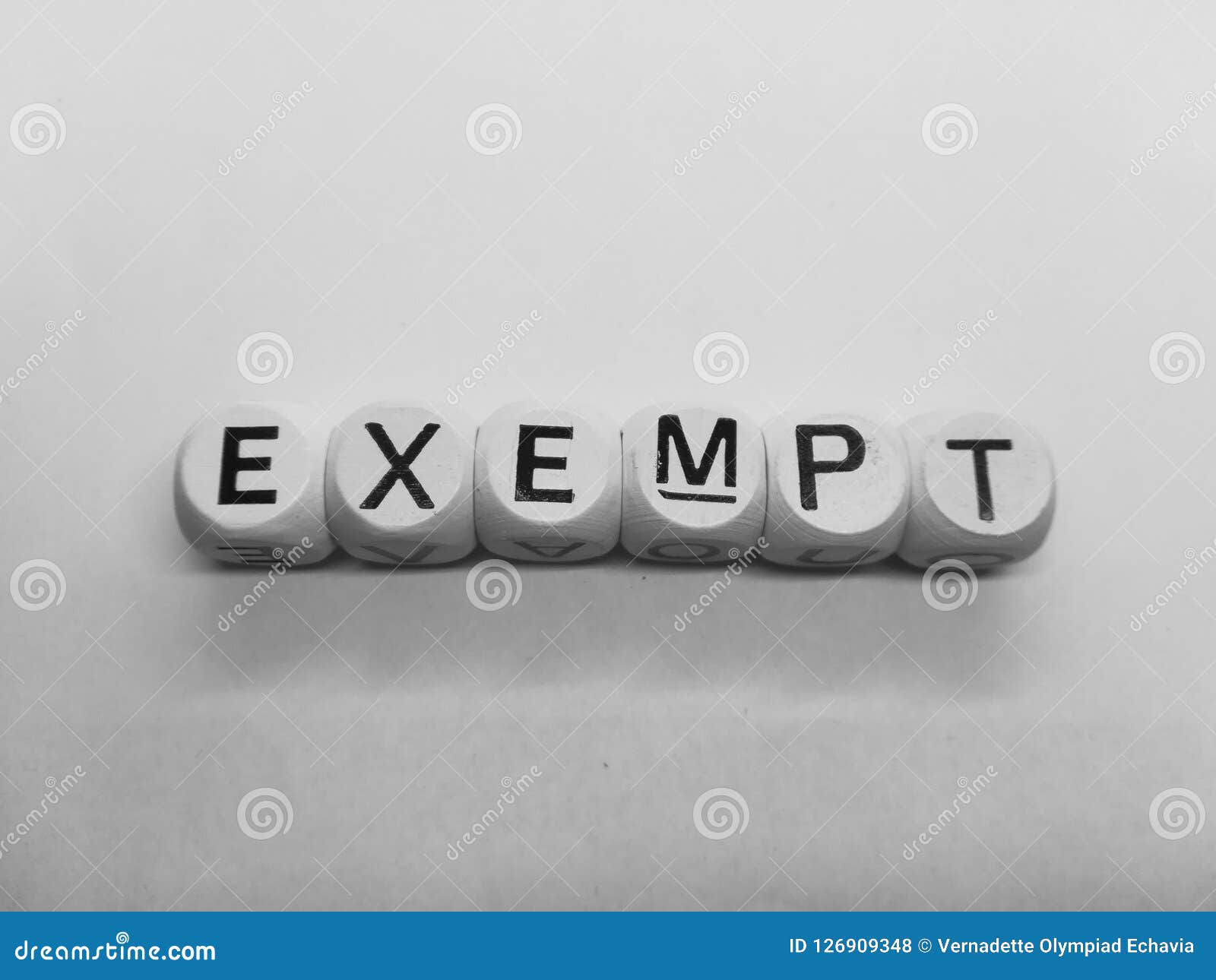 word exempt spelled in dice