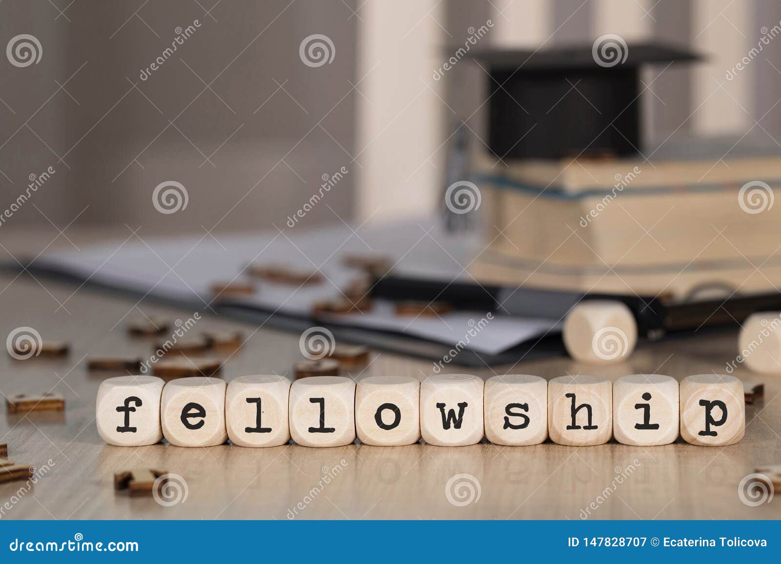 word fellowship composed of wooden dices