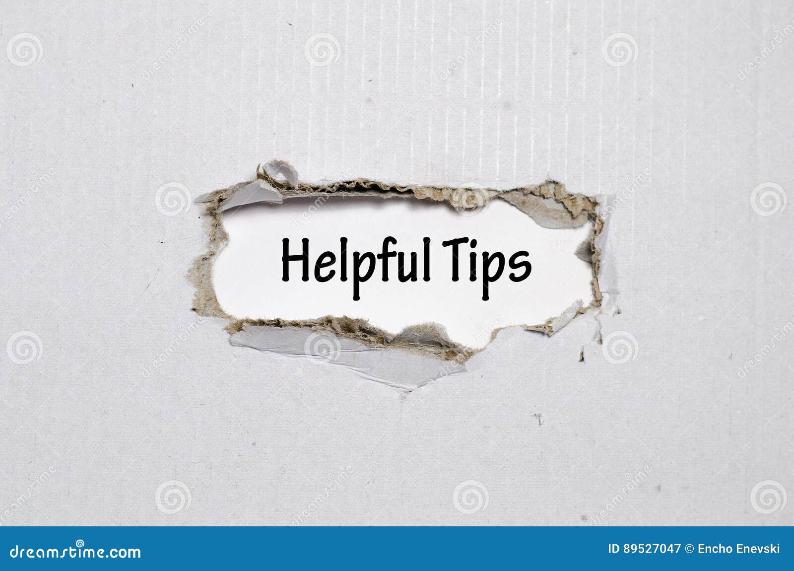 the word helpful tips appearing behind torn paper