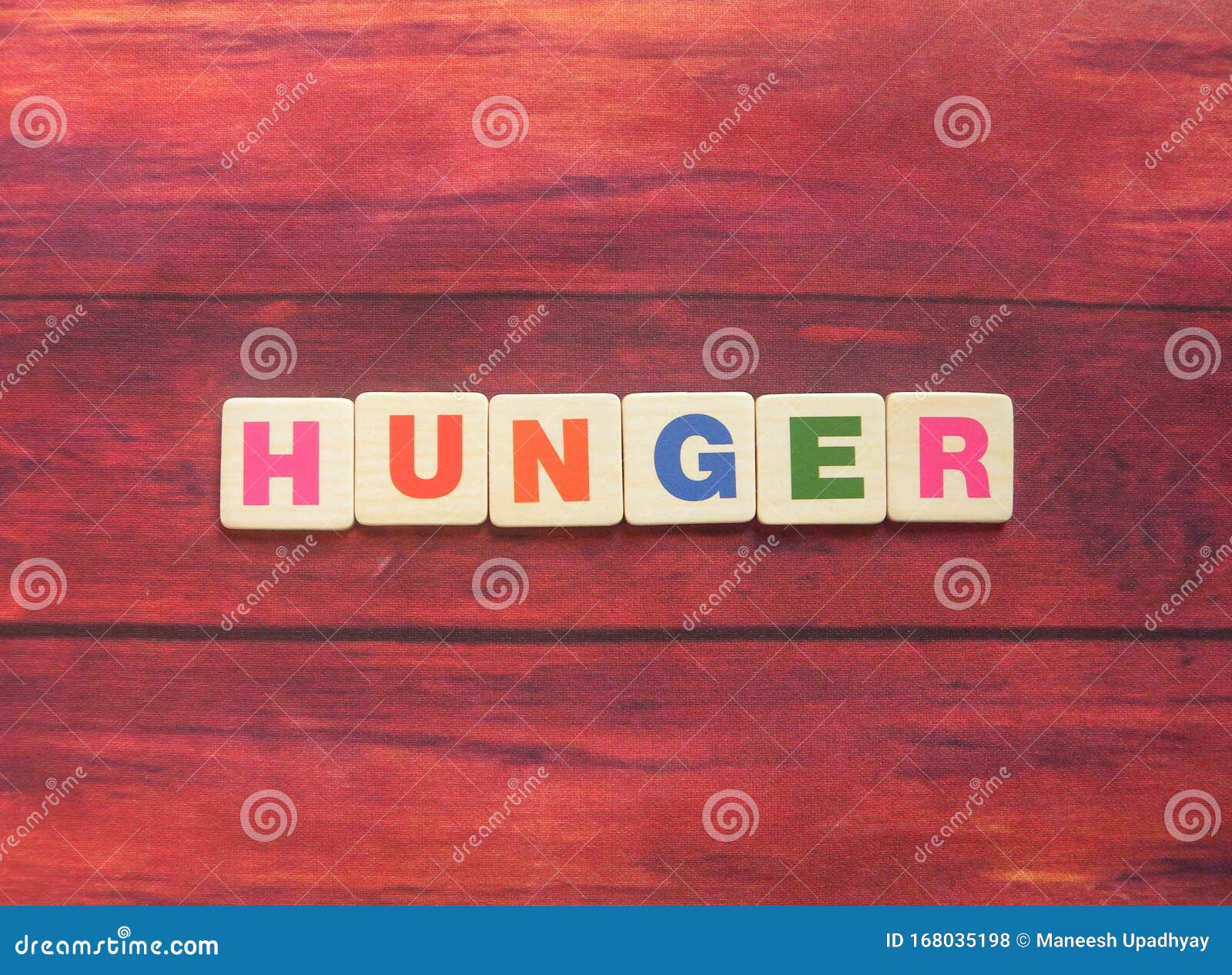 Word Hunger on wood stock photo. Image of concept, backgrounds 168035198