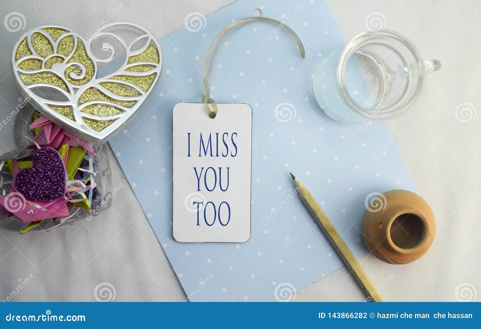 Word I Miss You Too Tag on Work Place Stock Photo - Image of ...