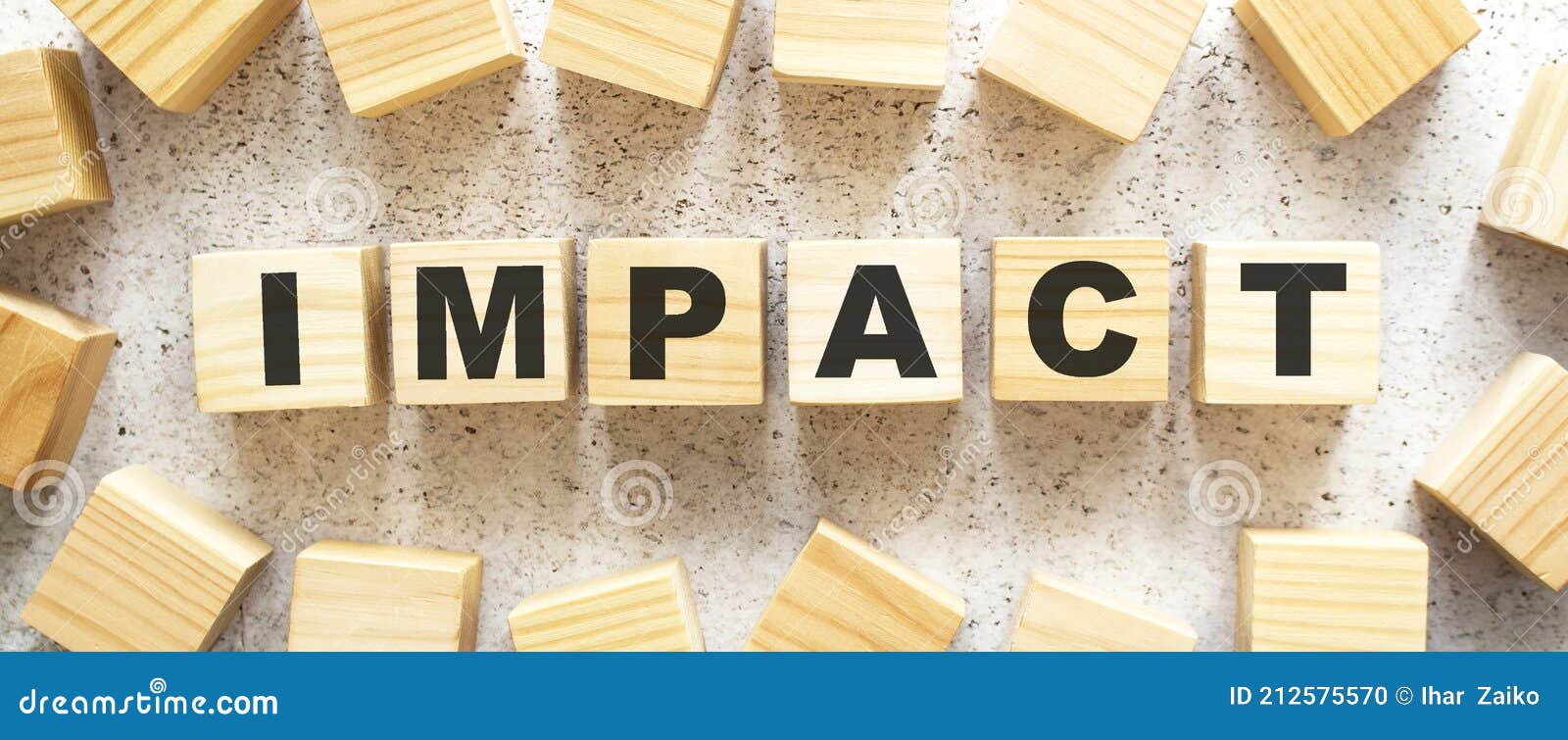The Word IMPACT Consists Of Wooden Cubes With Letters Top View On A the-word-impact-consists-of-wooden-cubes-with-letters-top-view-on-a