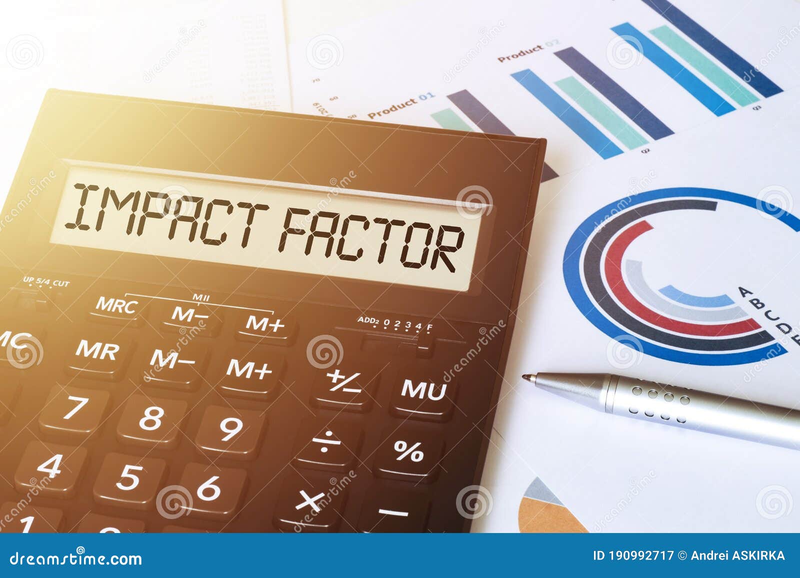 Word Impact Factor on Calculator. Business and Finance Concept Stock