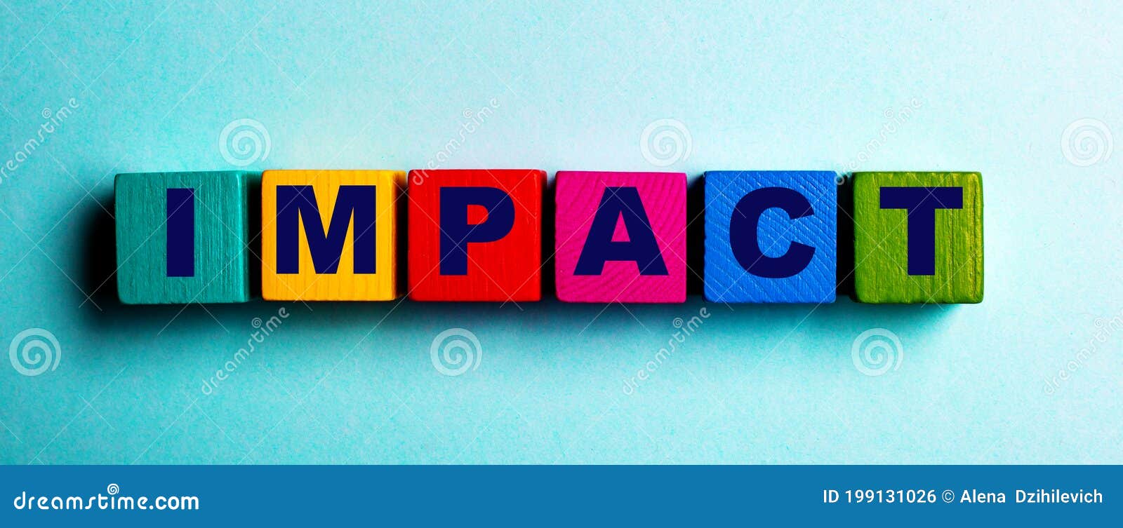 The Word IMPACT Is Written On Multicolored Bright Wooden Cubes On A the-word-impact-is-written-on-multicolored-bright-wooden-cubes-on-a