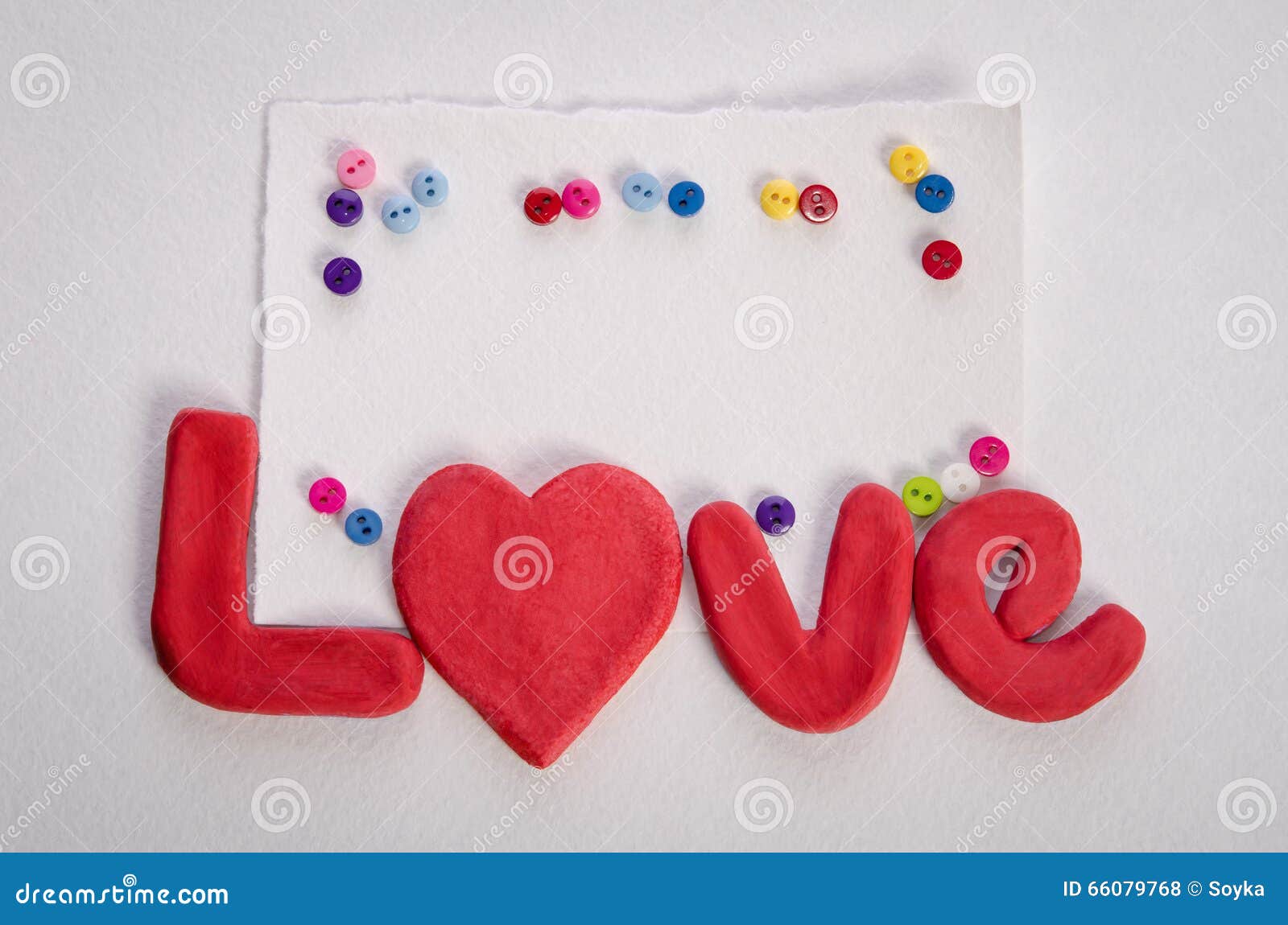 The word LOVE , empty card and colorfull buttons on white background