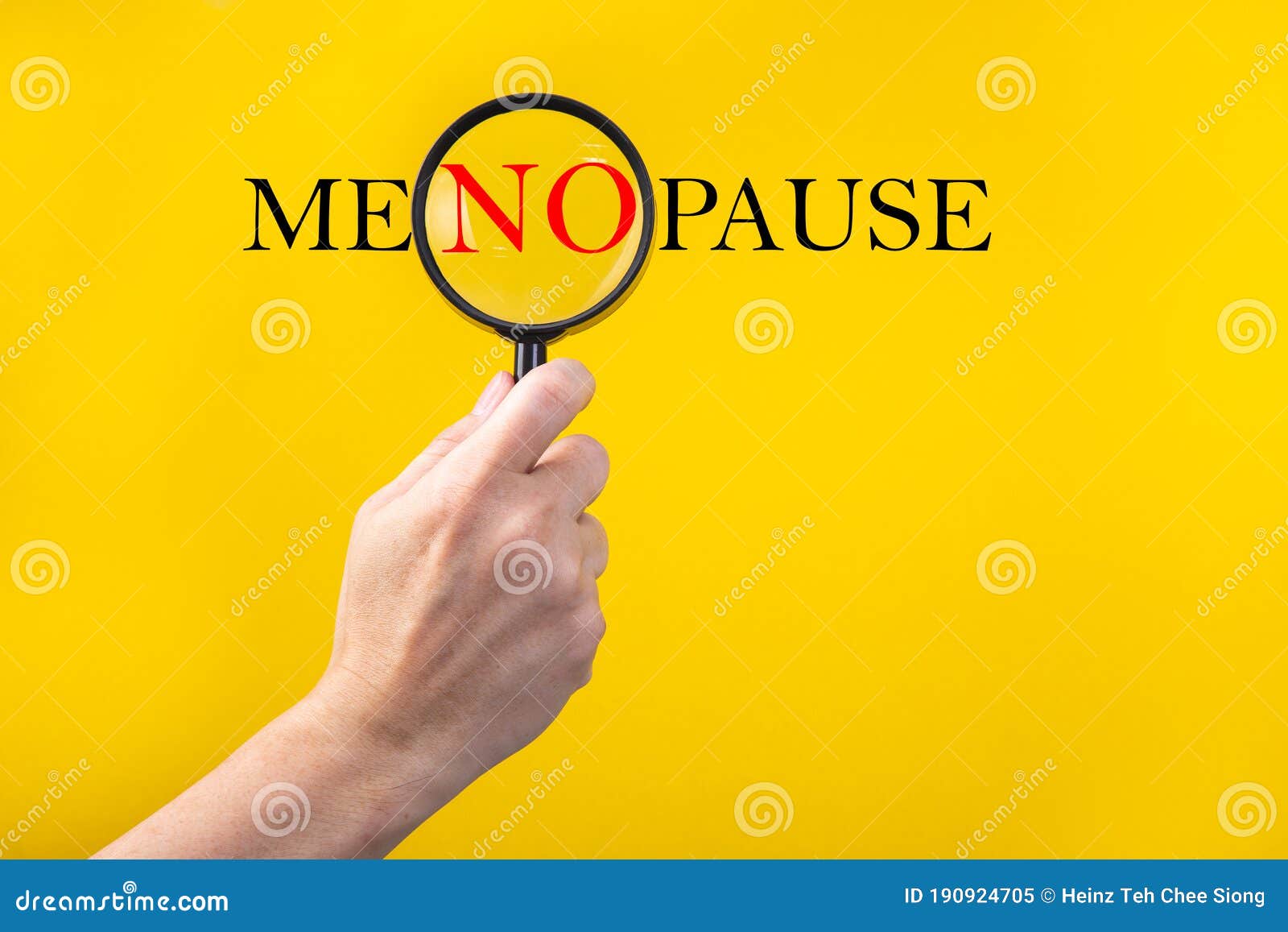 the word menopause through a magnifying glass