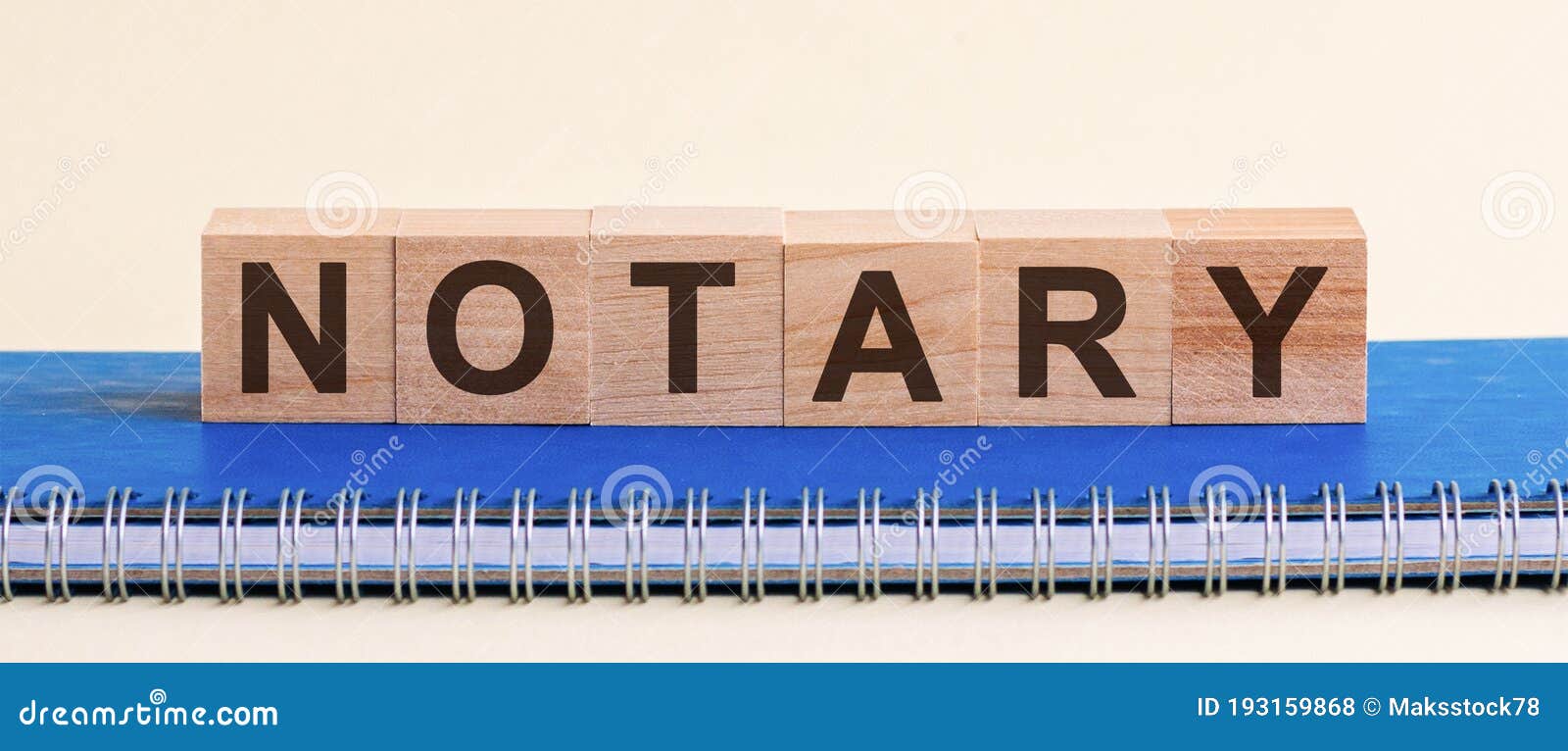 word notary formed by alphabet blocks, white background, front view