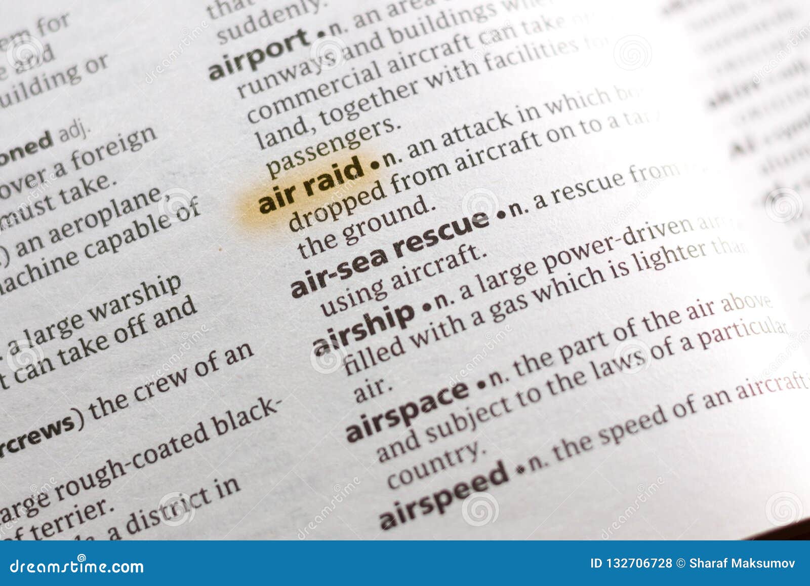 The Word or Phrase Air Raid in a Dictionary Stock Photo Image of