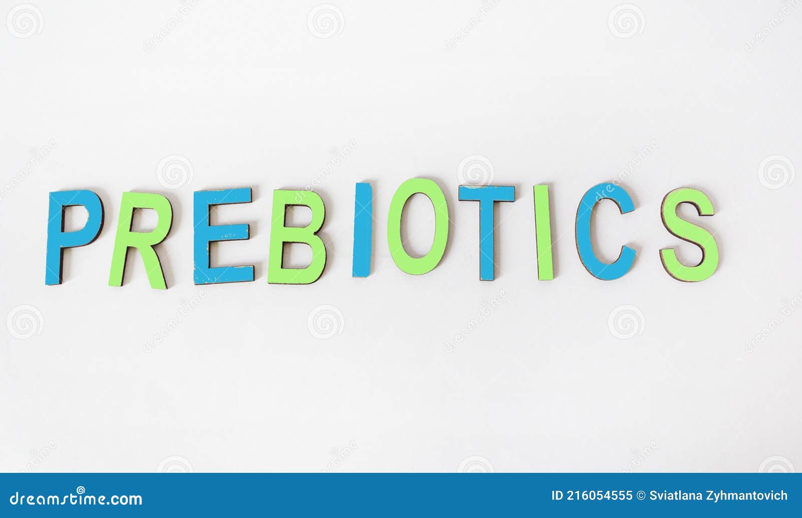 the word prebiotics is written in colored wooden letters