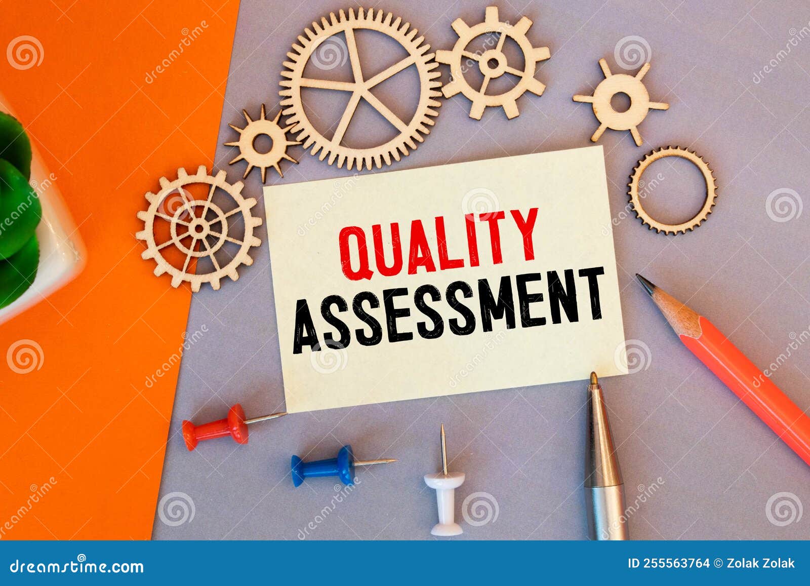 The Word Quality Assessment Written on a Notebook on Business Office