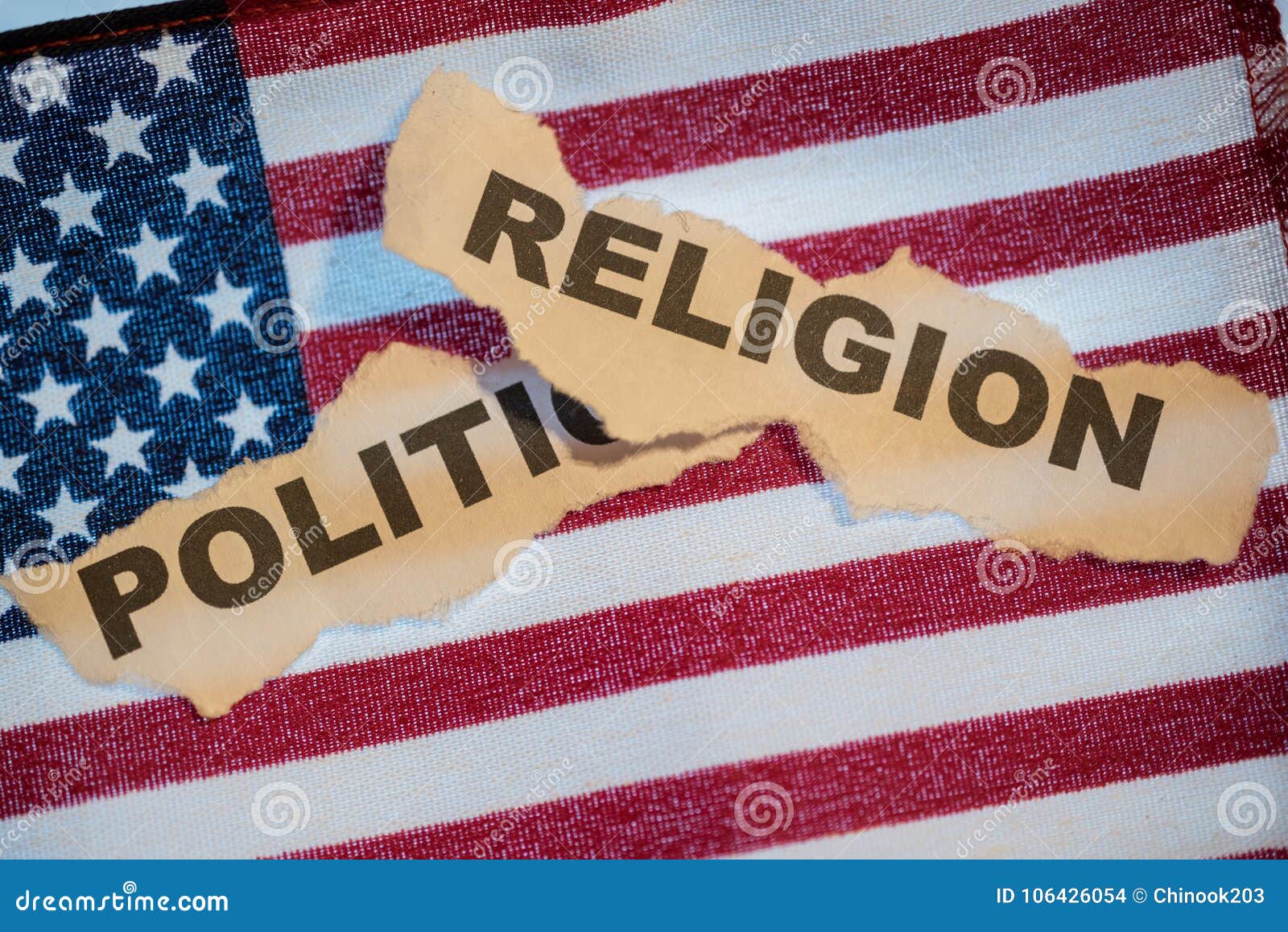 the word religion laying over the word politics on an american f