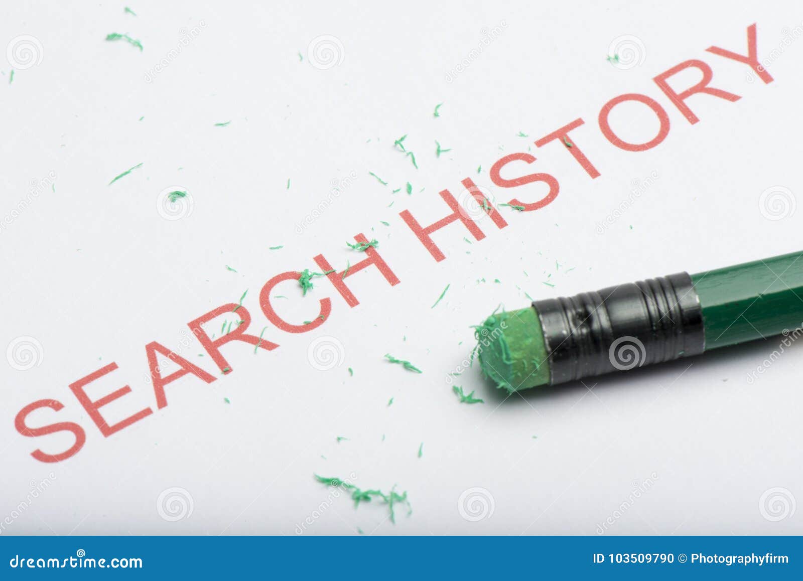 Word `Search History` with Worn Pencil Eraser and Shavings Stock Photo
