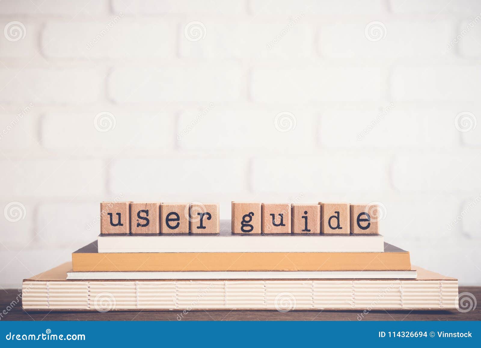 the word user guide and copy space background.