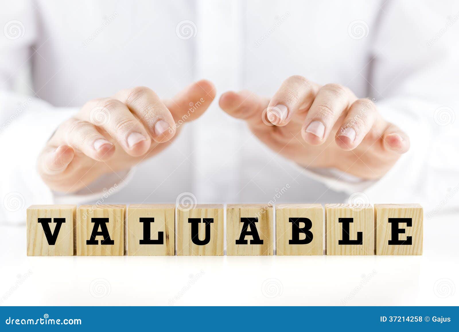 the word - valuable- on wooden cubes