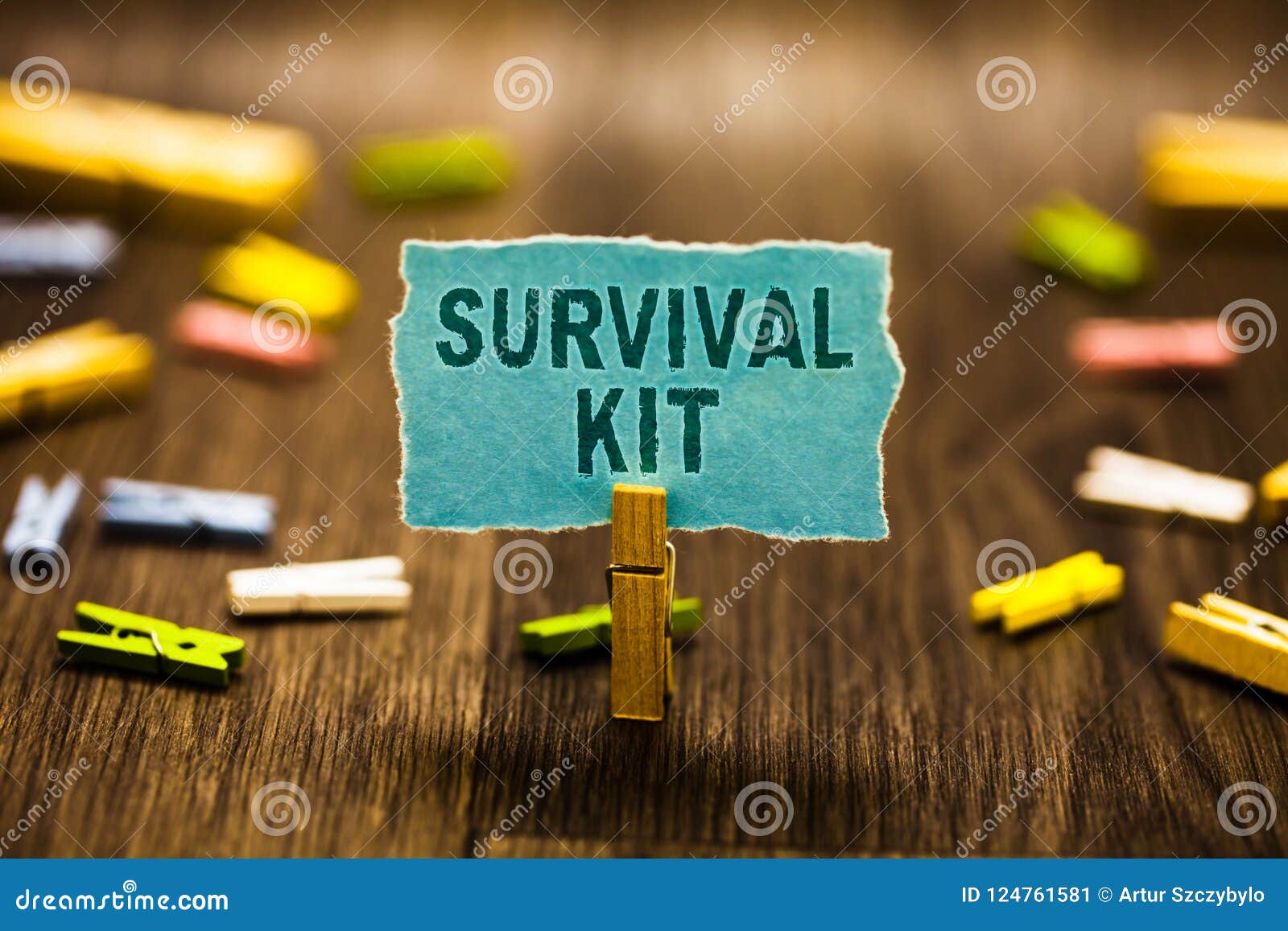 word writing text survival kit. business concept for emergency equipment collection of items to help someone clothespin holding bl