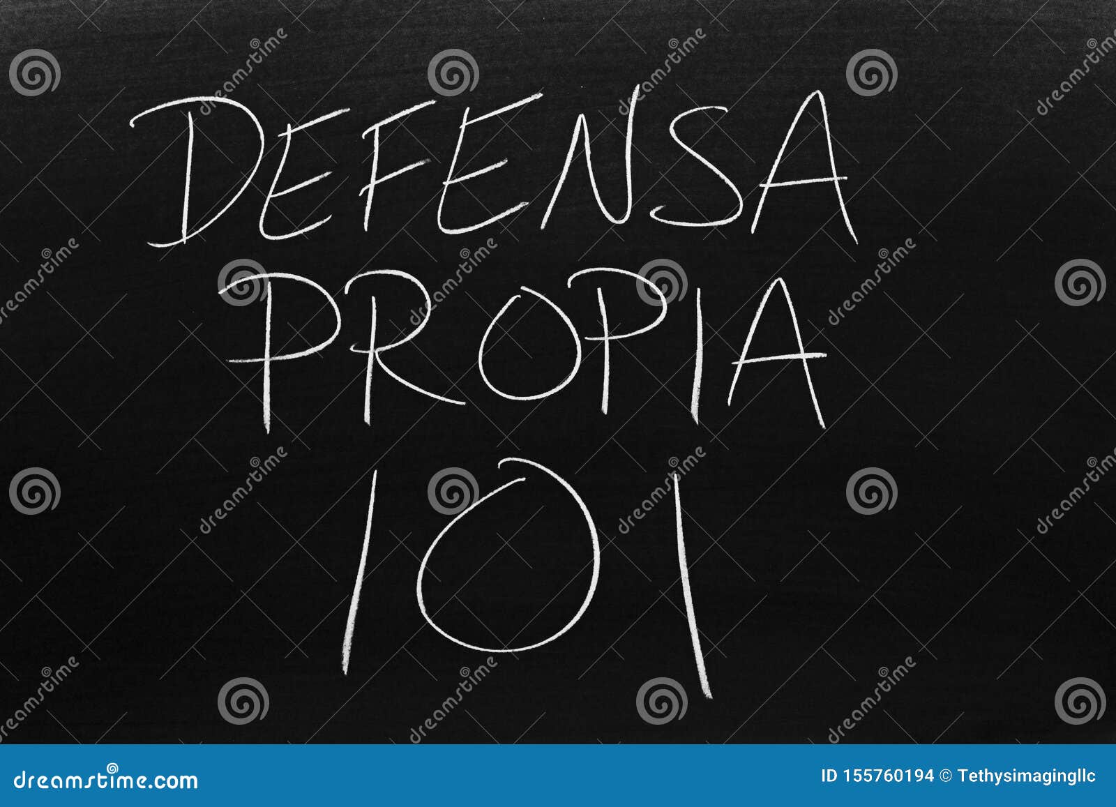 defensa propia 101 on a blackboard.  translation: self defense 101