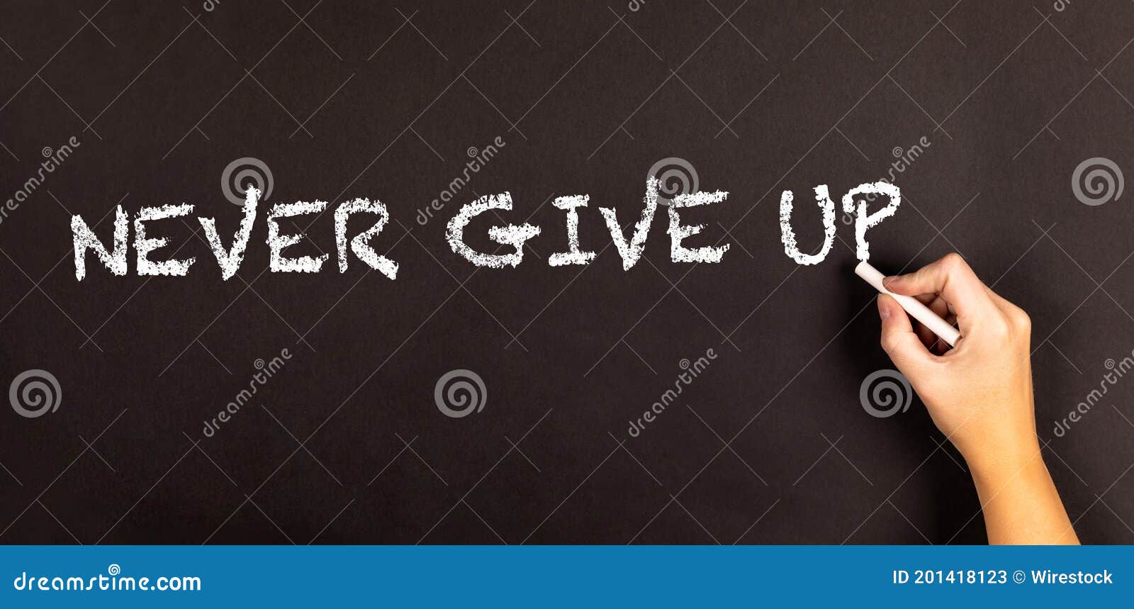 words never give up written on a blackboard