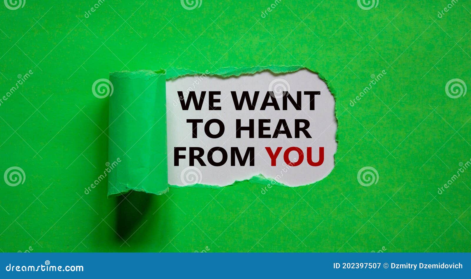 the words `we want to hear from you` appearing behind torn green paper. beautiful background. business concept