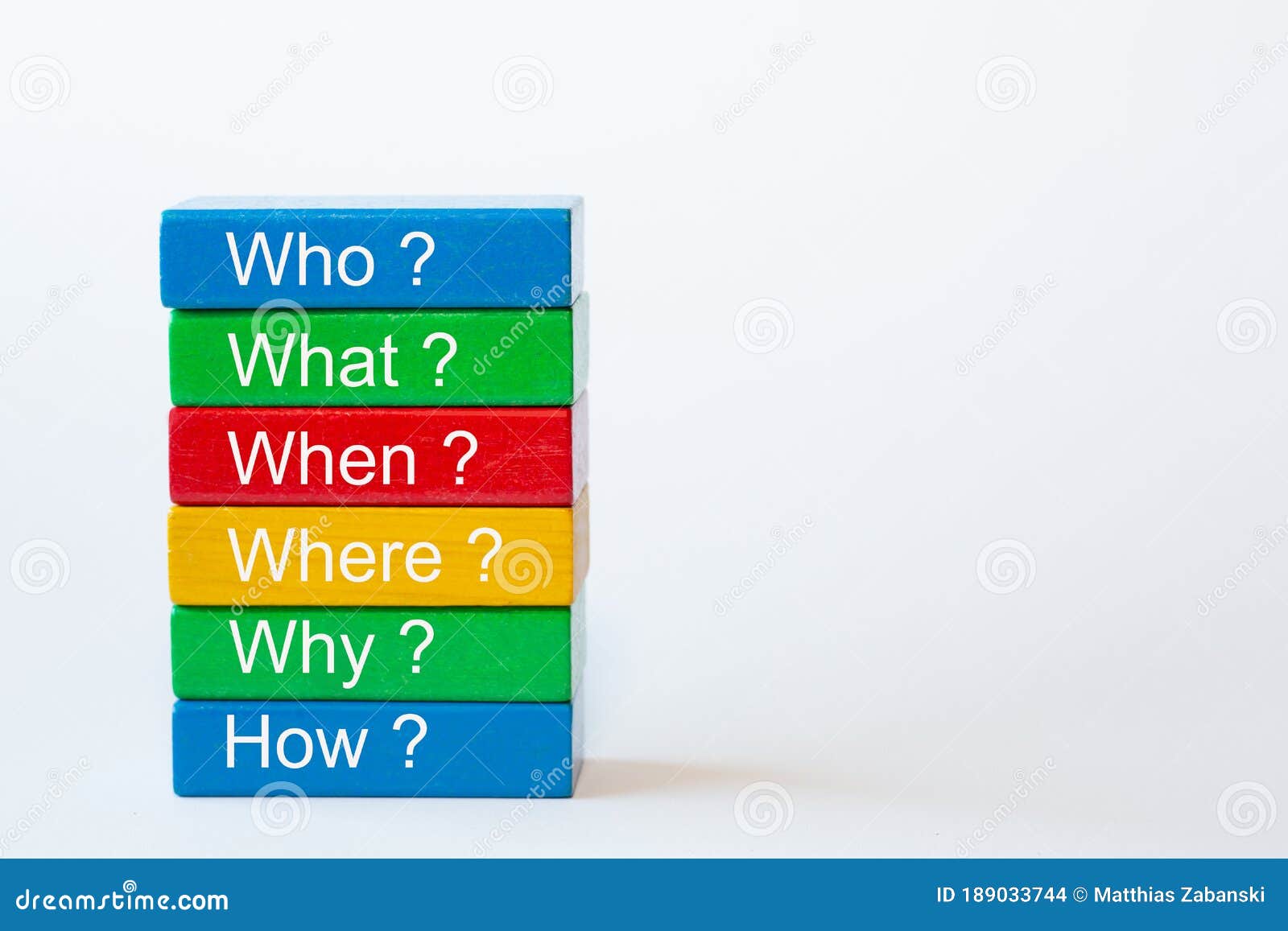 the words: who, what, when, where, why and how are written on colorful blocks