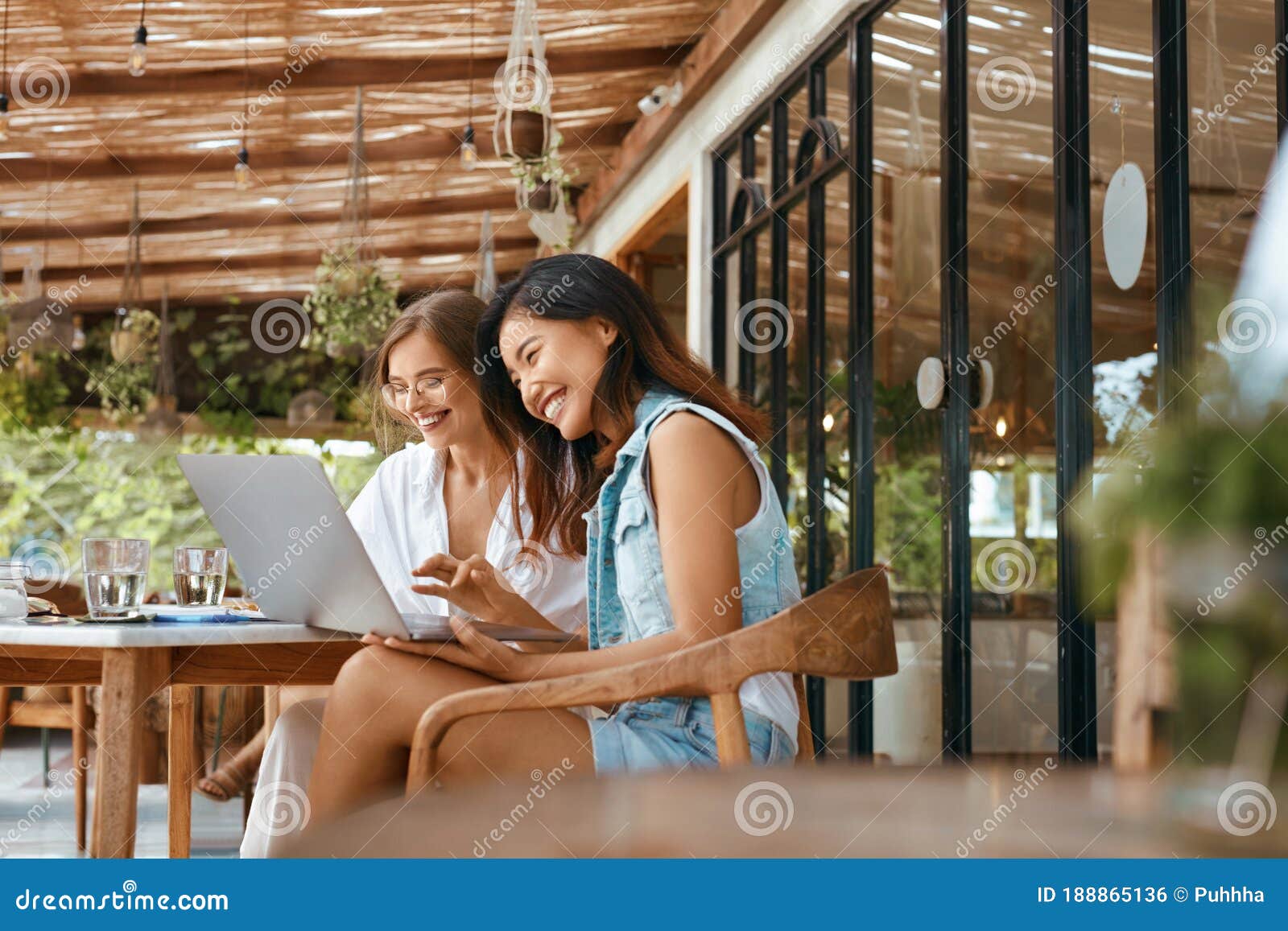 Work at Cafe. Women Using Laptop for Online Meeting. Happy Colleagues in Casual  Outfit at Coffee Shop Stock Photo - Image of online, notebook: 188865136