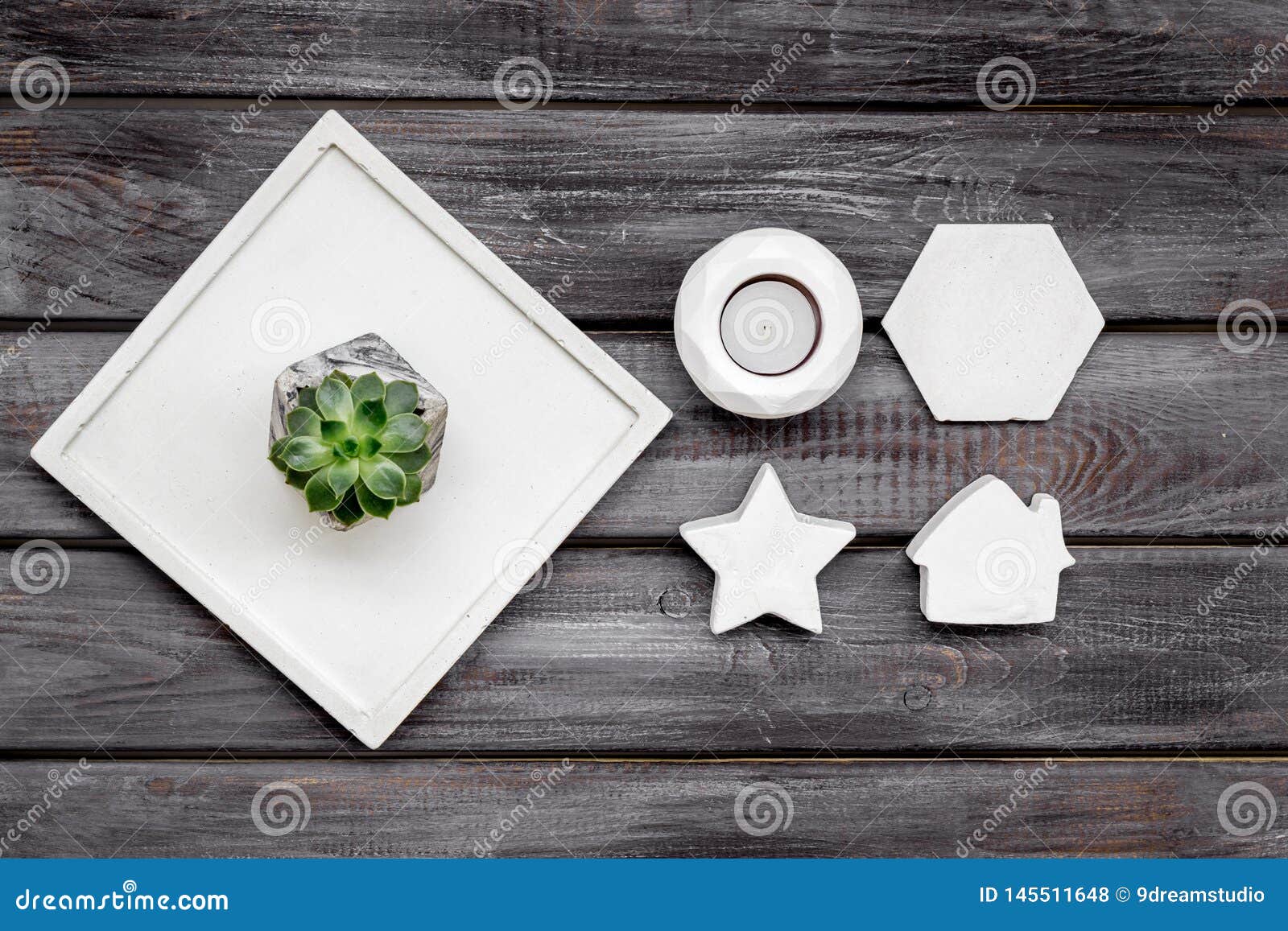 Work Desk Design With Concrete Decorations Candle And Plant On