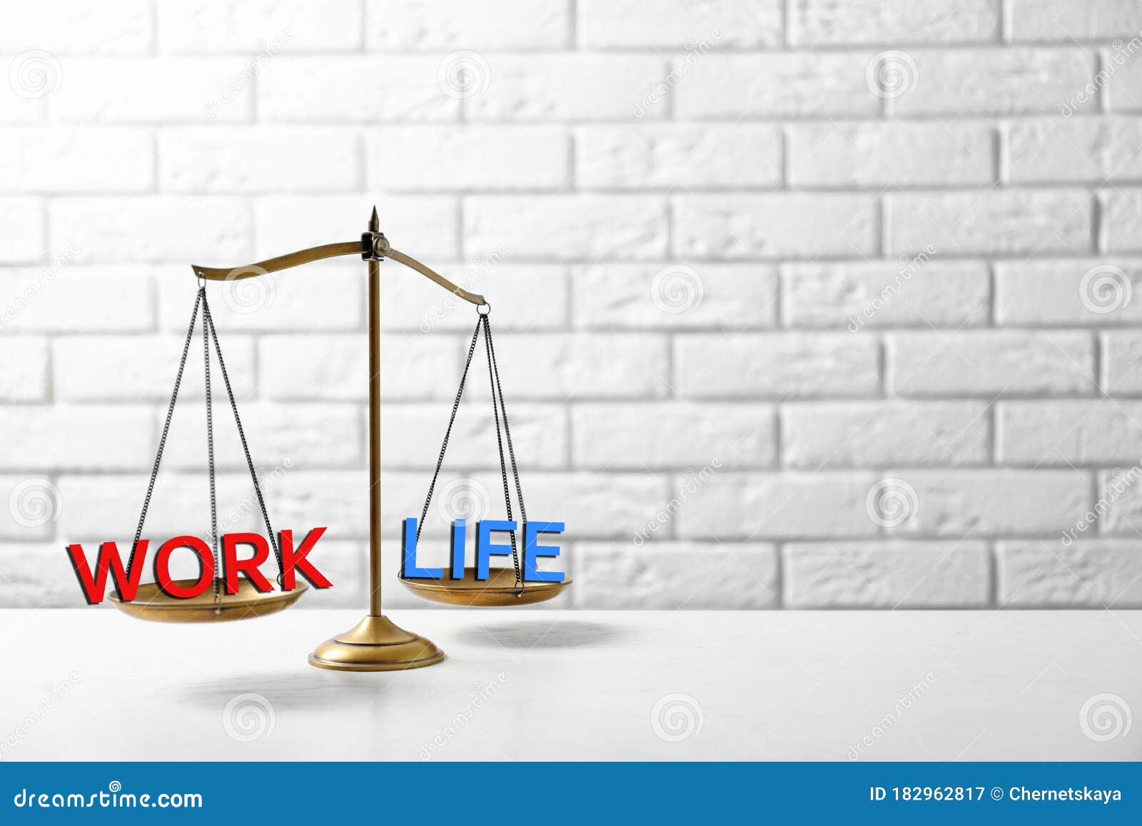 Worklife Balance. Scale with Words on Table, Space for Text Stock