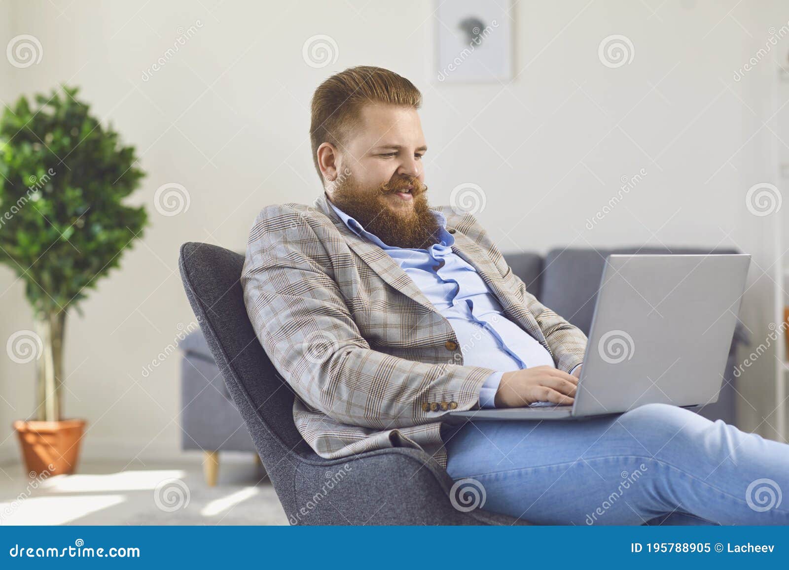 Work Online at Home Office. Funny Fat Man Works Using a Laptop in ...