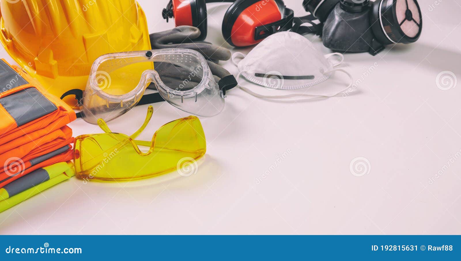 work safety protection equipment background. industrial protective gear on white
